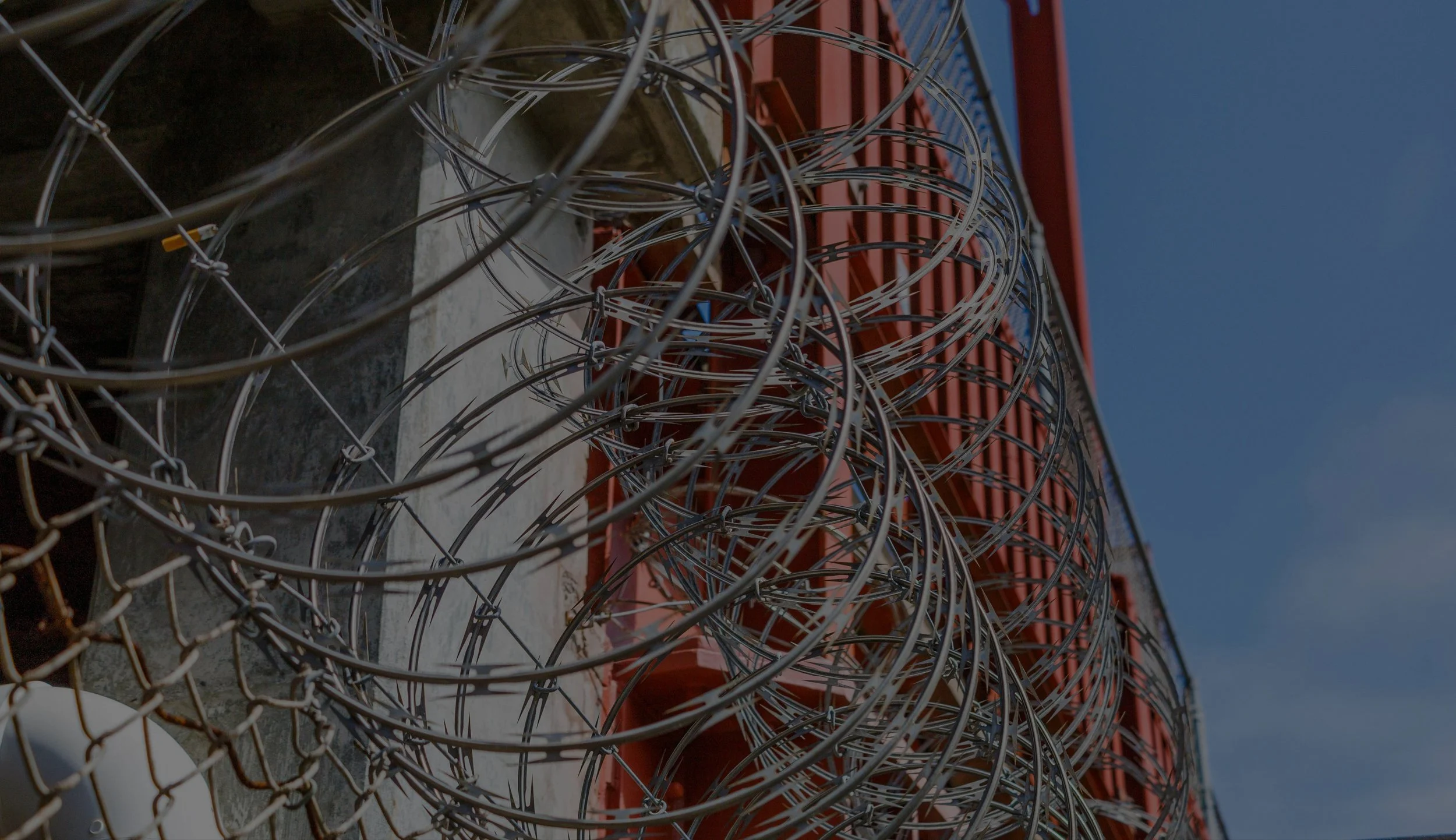 Barbwire Prison Fence.jpg