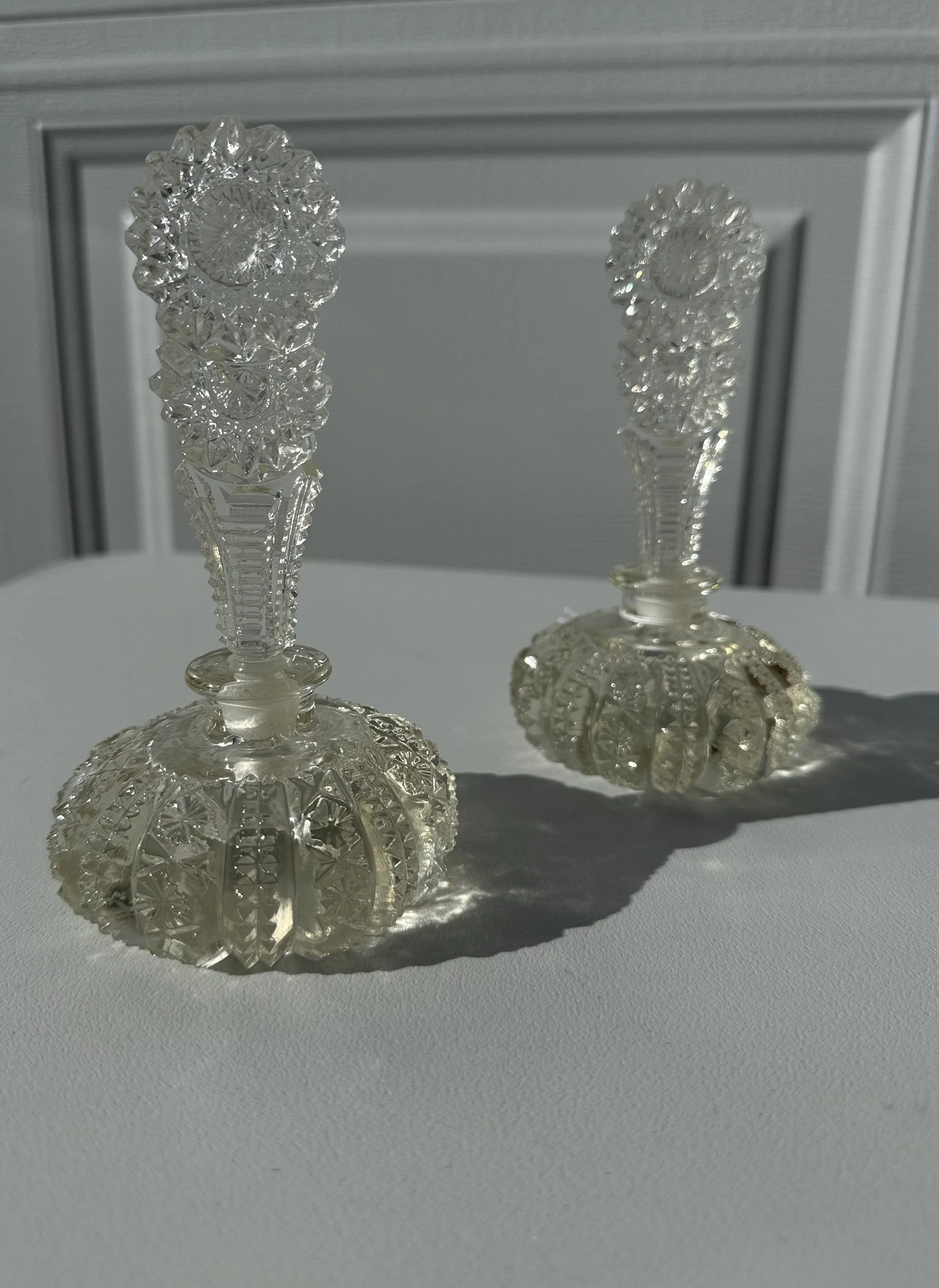 1920's sunflower crystal perfume vessels (set of 2)