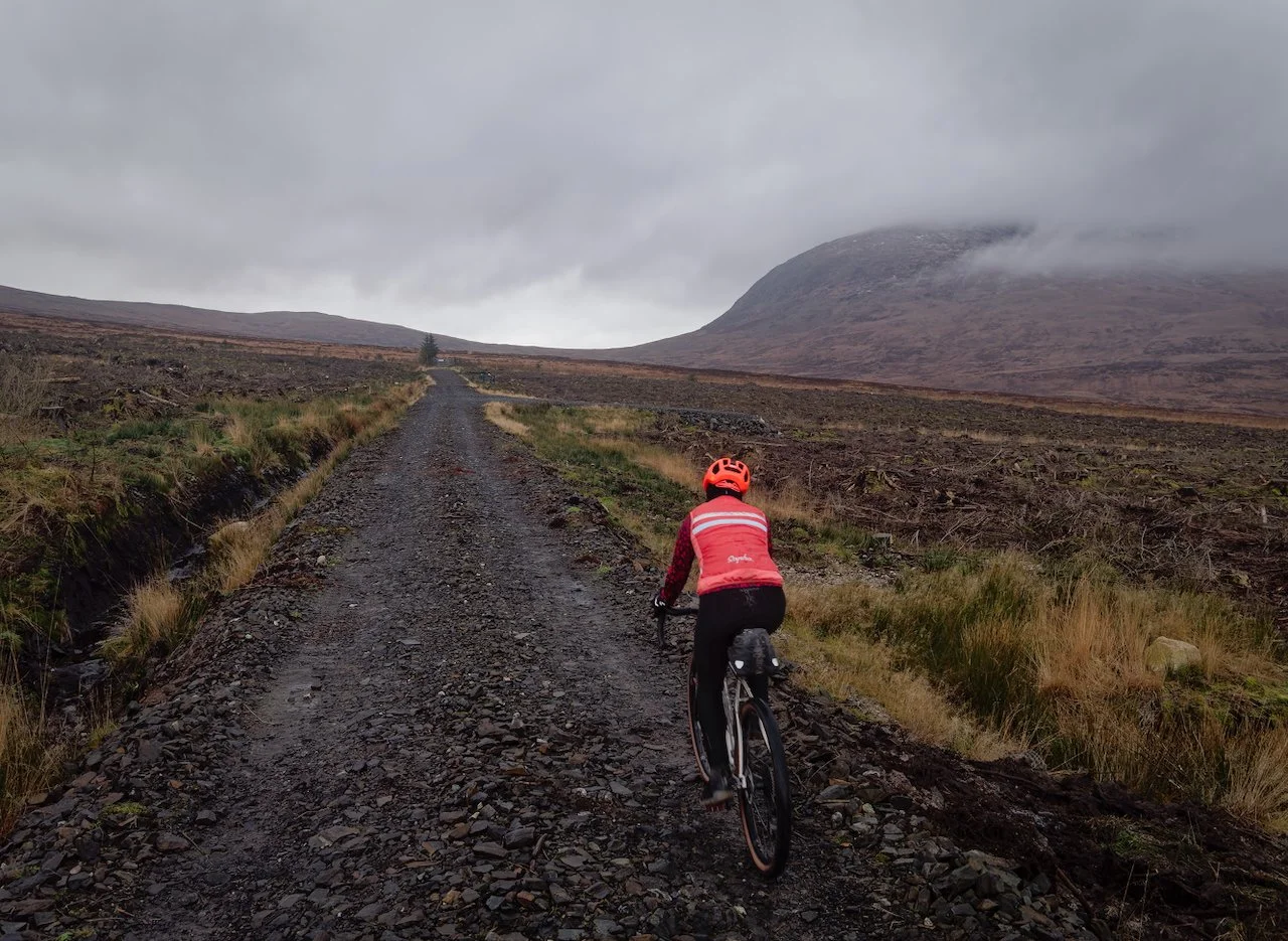 A puncture on the climb out of Gatehouse. Should we turn back, it's an icy 2'c. We changed the tube and went on with tyres crunching the ice. We had a plan, but sheets of ice on both route options made us turn around. " Let's try this dead end t