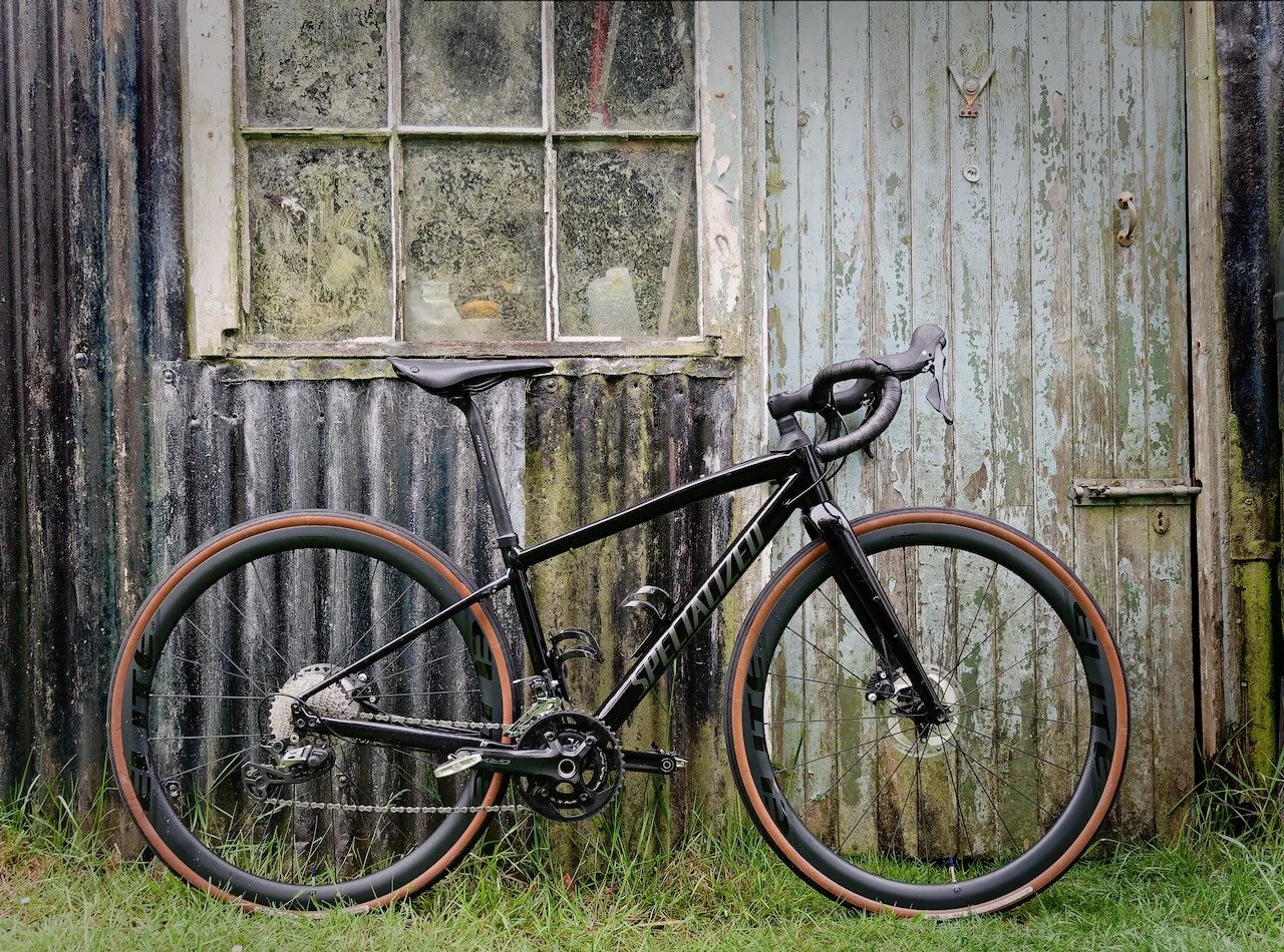 It is not worth having a dedicated summer road bike. Not when you have a backup gravel bike that can be turned into a great road bike with Ali Express carbon wheels from Elite - they get great reviews, but time will tell. Panaracer slick 32mm are wha