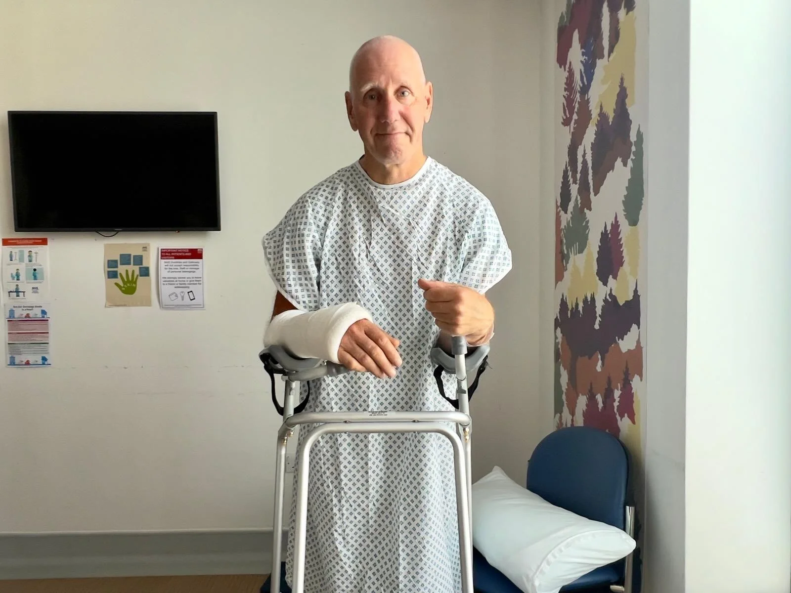 Warren standing. Warren is mobile with a frame. 
He claims, in a fire he could get out unaided 😳 
10 days since the accident, so that is fantastic. If he didn&rsquo;t have the complicated arm fracture, he might even be out now! 
I have seen the X-ra