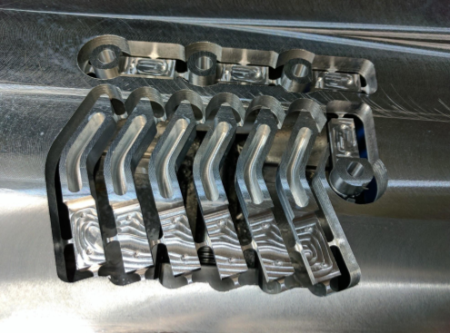 We got the upper and lower finger sections machined by the fine folks at GrayGo Industries in beautiful Junction City, Oregon.