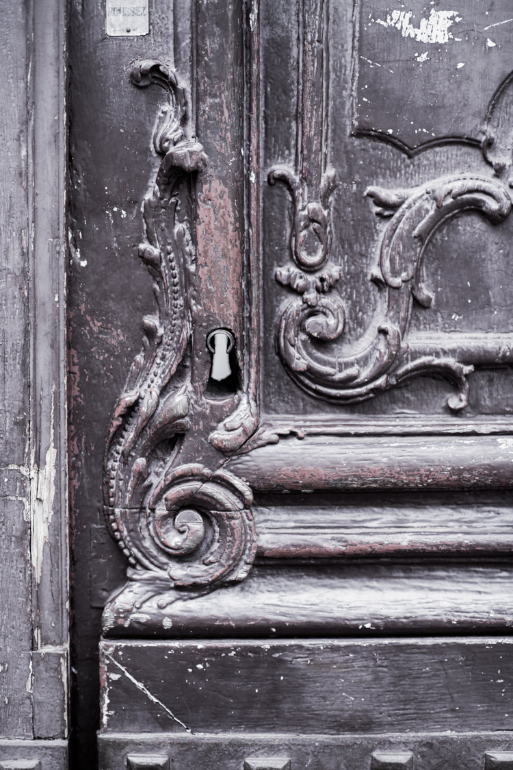 Paris pictures, detail of worn door wood carving