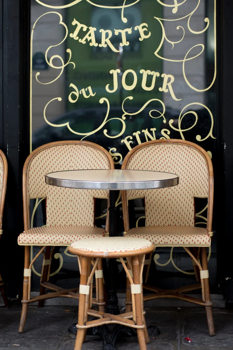 Paris pictures, cafe table and chairs and tarte du jour sign