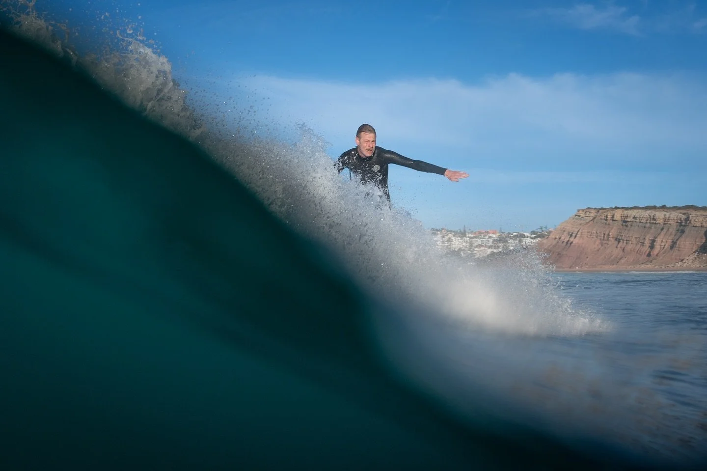 swipe for spray 💦 @avsinglefins by @nicomallaret in Portugal 🇵🇹 Andy shapes his own @middle_earth_surfboards and wears chariots suits &bull; if you want authentic late sixties feels try and get hold of one for your evolutionary needs ☀️ 

Photo wi