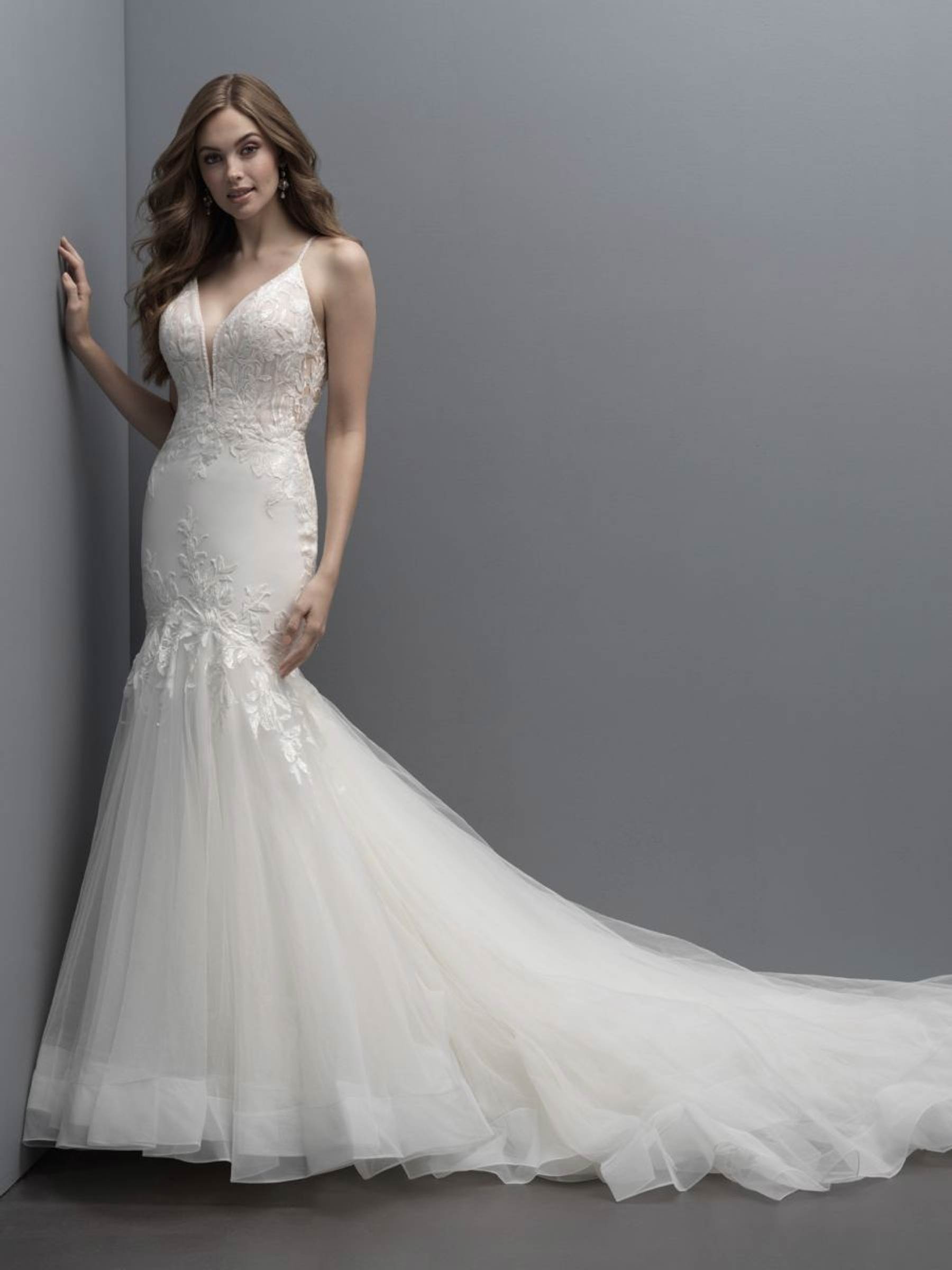 Luxurious Beaded Wedding Dress with Lace Detail and Flared Skirt