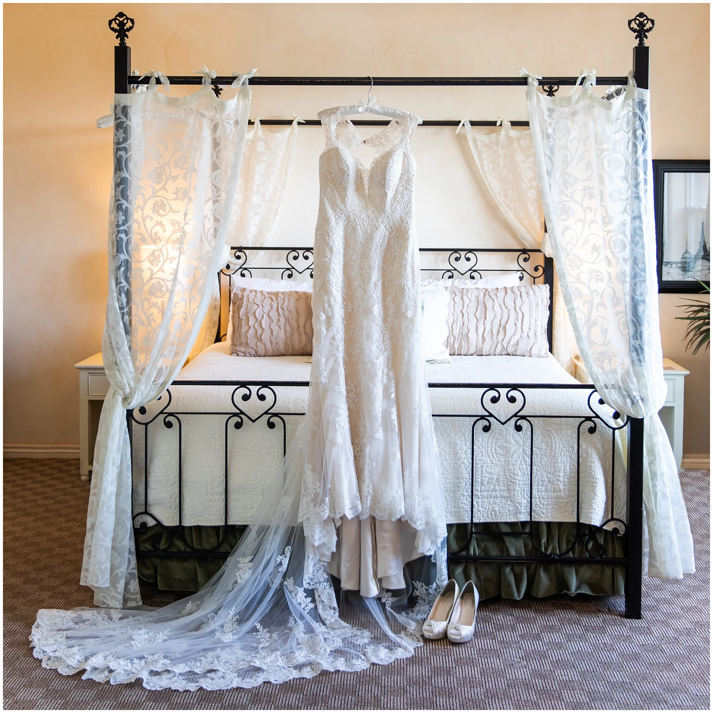 The bed in the bridal suite lends itself beautifully to display a wedding dress.