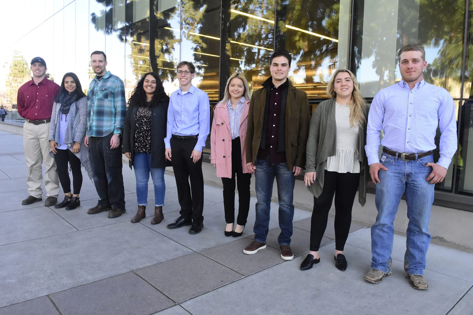 Kajai Xiong (fourth from the right) with fellow Honors Program members after the induction ceremony