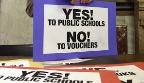 Action Alert: Stop the Voucher Scam Expansion