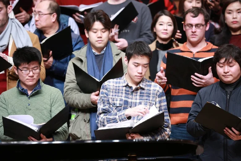 Gleeks rehearse amid the members of the Gunsan Civic Chorale