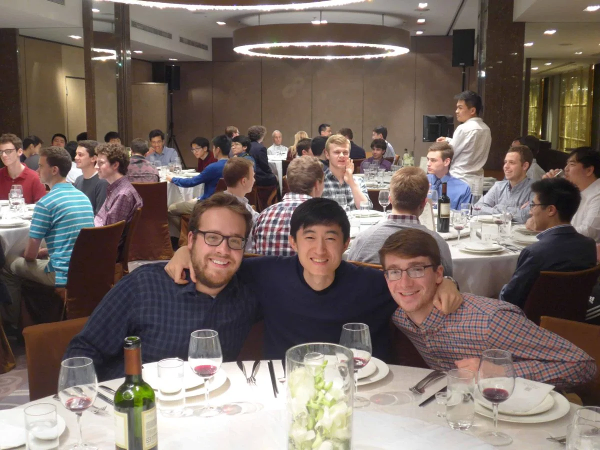 Dennis and both Connor and Connor enjoy their meal at the reception