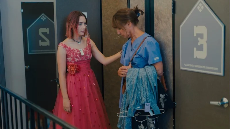 Saoirse Ronan and Laurie Metcalf share a repressed moment.
