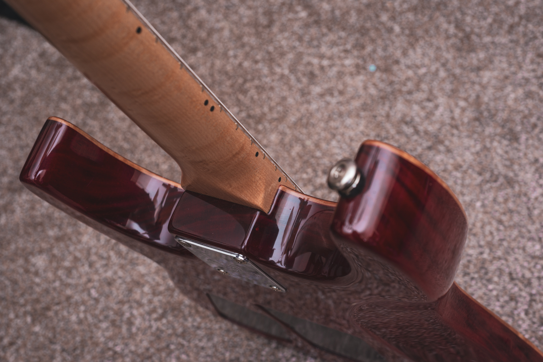The mahogany body is beautifully figured in its own right, though not as flashy as the maple pieces.