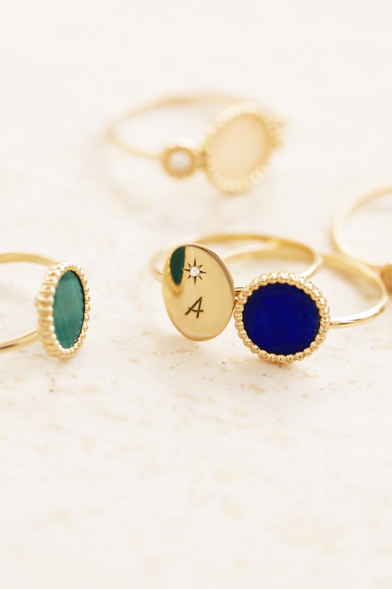 Rings from the Nuances  collection - 18K gold malachite and lapis lazuli