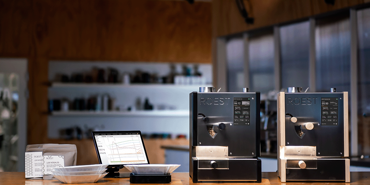 ROEST L200 Plus sample coffee roaster, side by side two roasters in wood and black design, operating in a quality control lab, part of a professional workflow for evaluating coffee samples