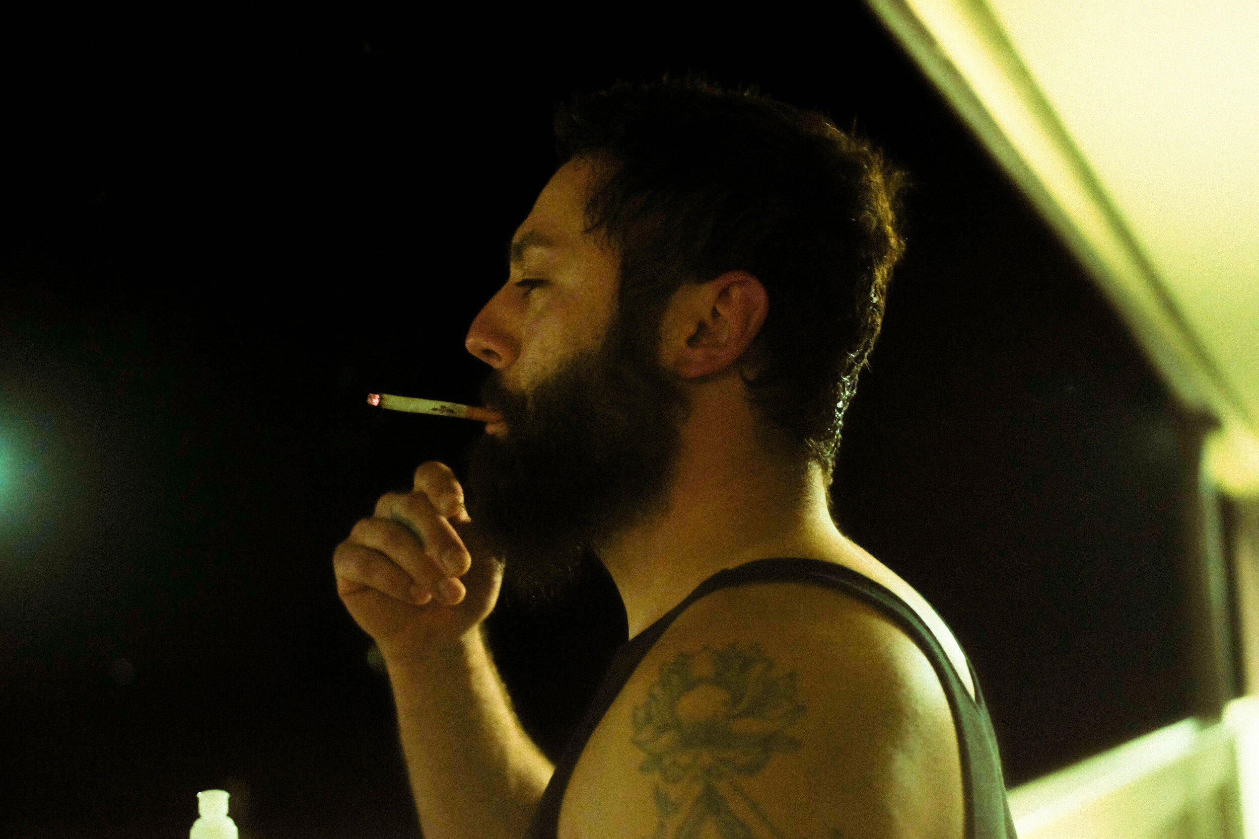 Daniel smoking on the balcony.jpg
