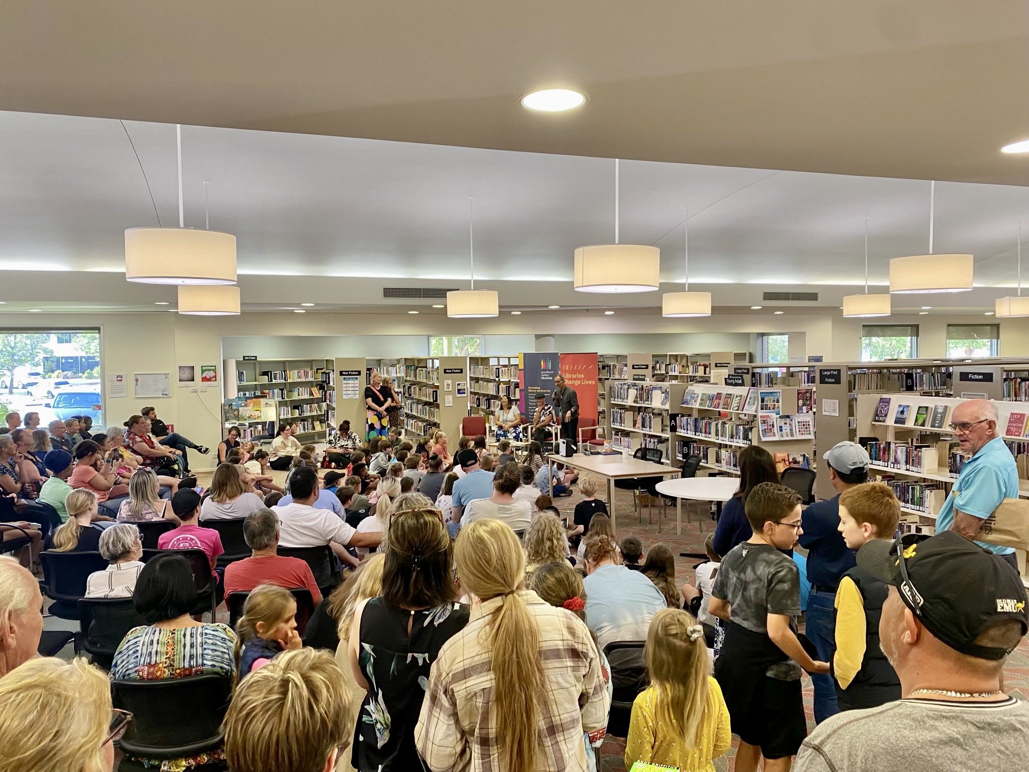  Aimee Chan with Andy Griffiths and Trent Roberts at the first ever launch of Juvenilia to flood-affected communities in Shepparton, January 2023 