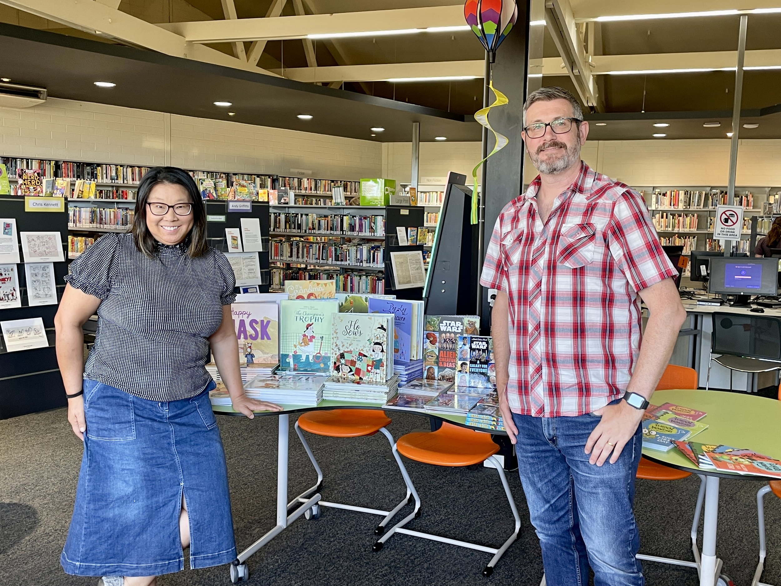 Aimee Chan and illustrator Chris Kennett at the launch of Juvenilia to flood-affected communities in Seymour in March 2023 