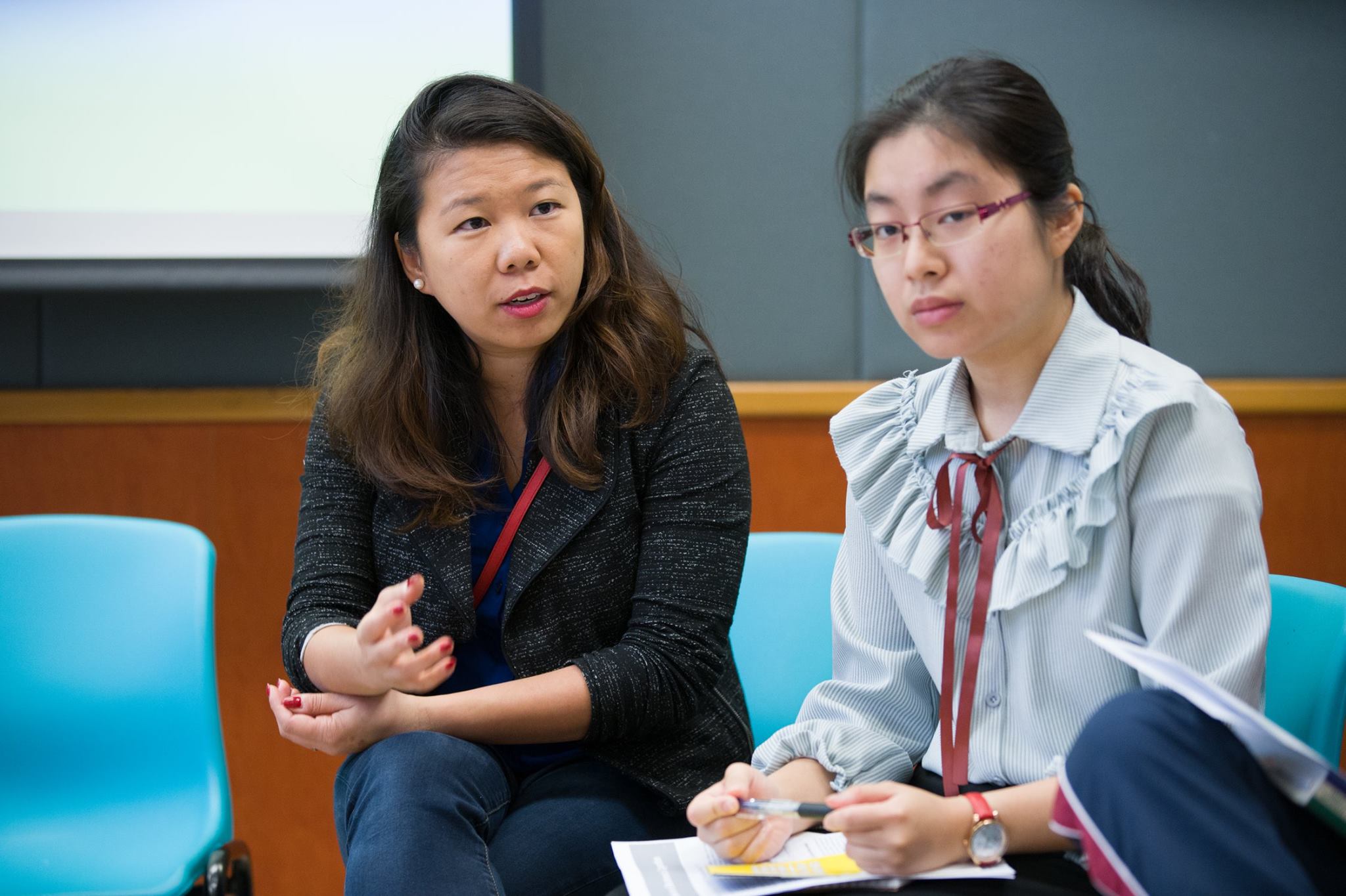 Sky Siu (Executive Director of KELY Support Group) listening intently to the participants’ views
