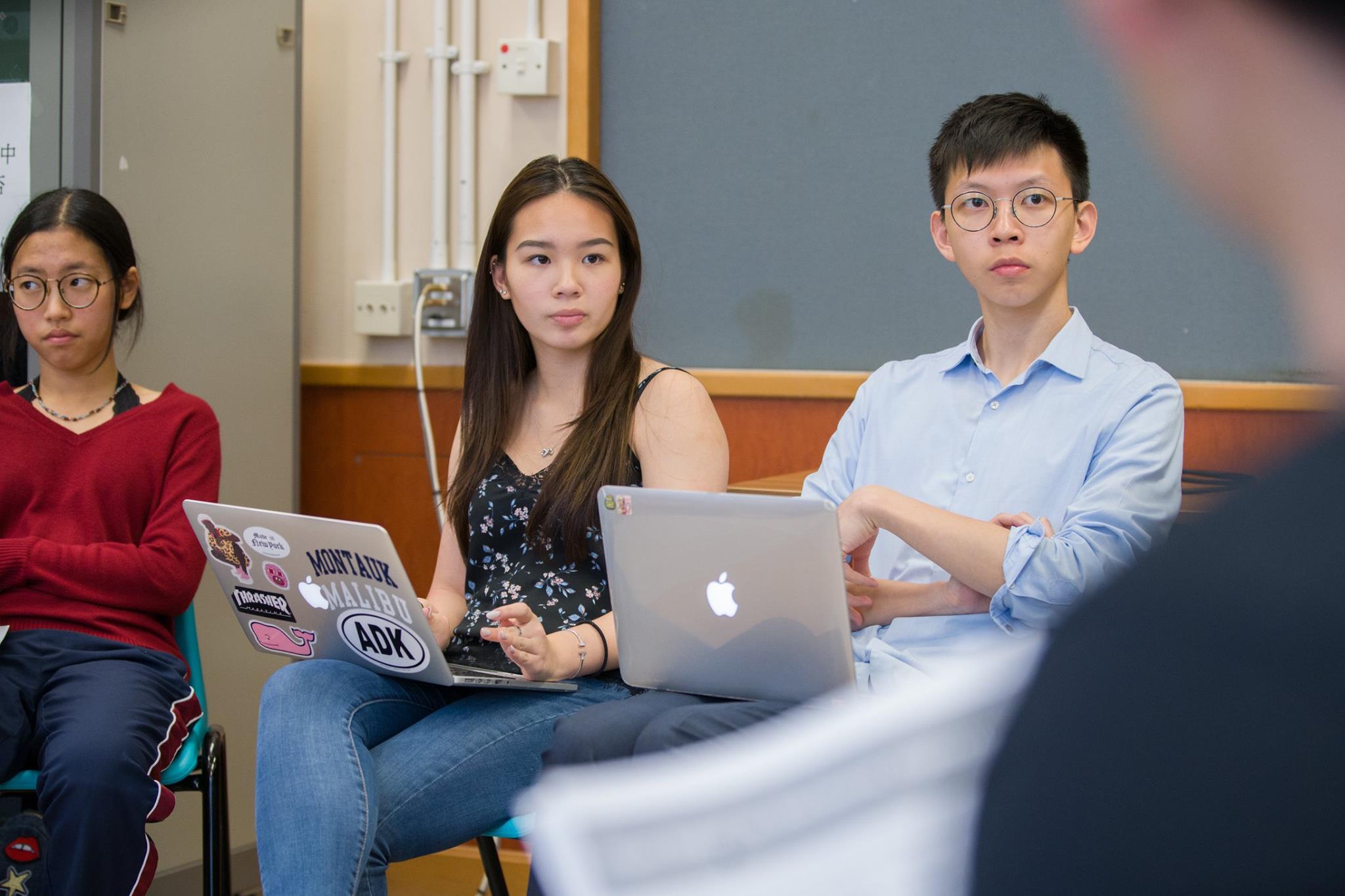 Youth Director, Tidal Wave Series Joelle Chan and President Alex Yu listening in on discussions