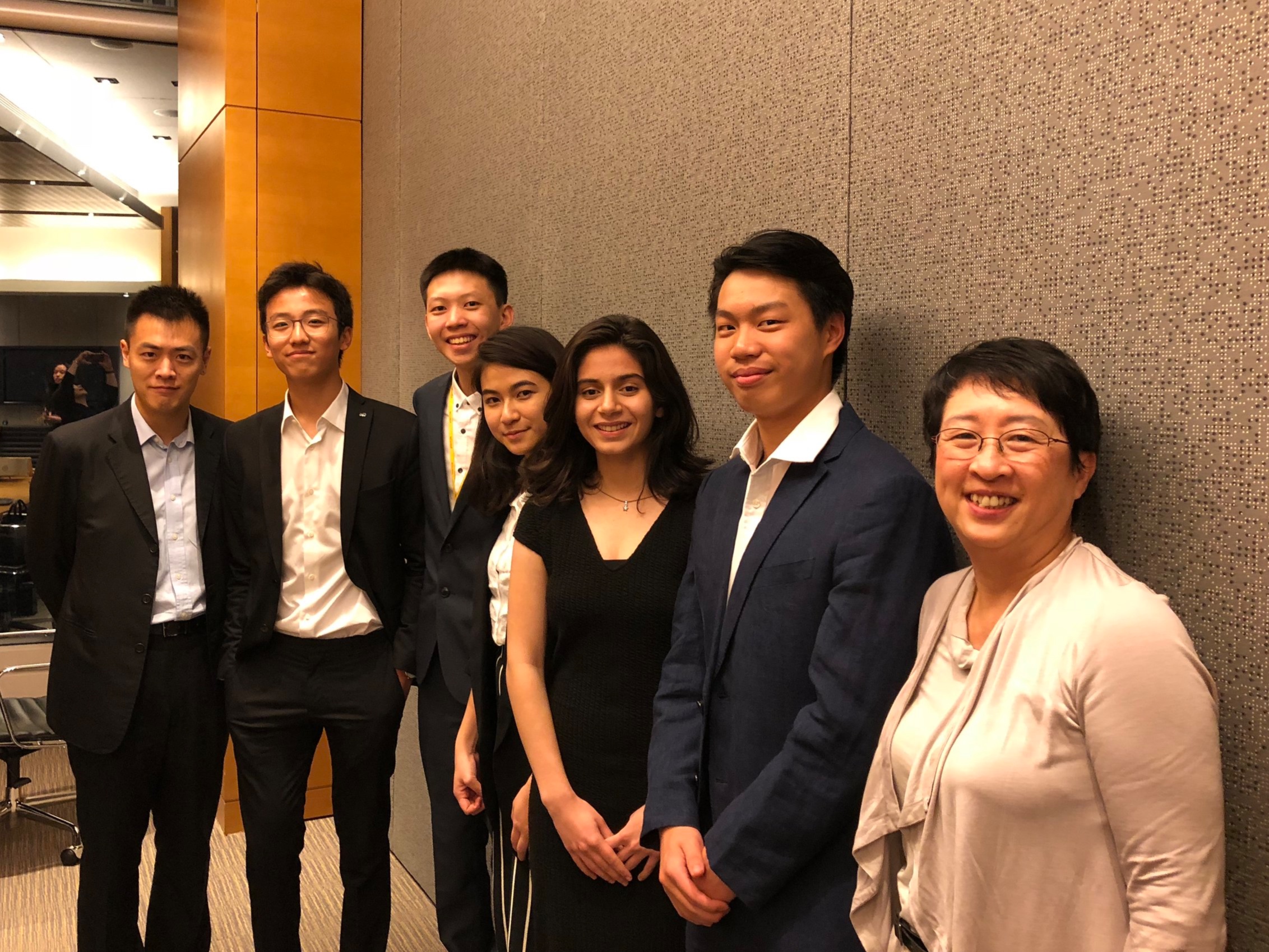 Mr. Ming Wai Lau, GBS, JP, Chairman (1st Left), Mr. Dickson Yau, Vice President Administration (2nd Left), Mr. Alex Yu, President (Designate) (3rd Left), Ms. Francisca Lam, Co-Vice President, Operations (4th Right), Ms. Sana Khullar, Co-Vice President, Operations (3rd Right), Mr. Chad Ho, Youth Director, Board and President's Office (2nd Right), Mrs. Peonie Wong, Executive Director (1st Right)