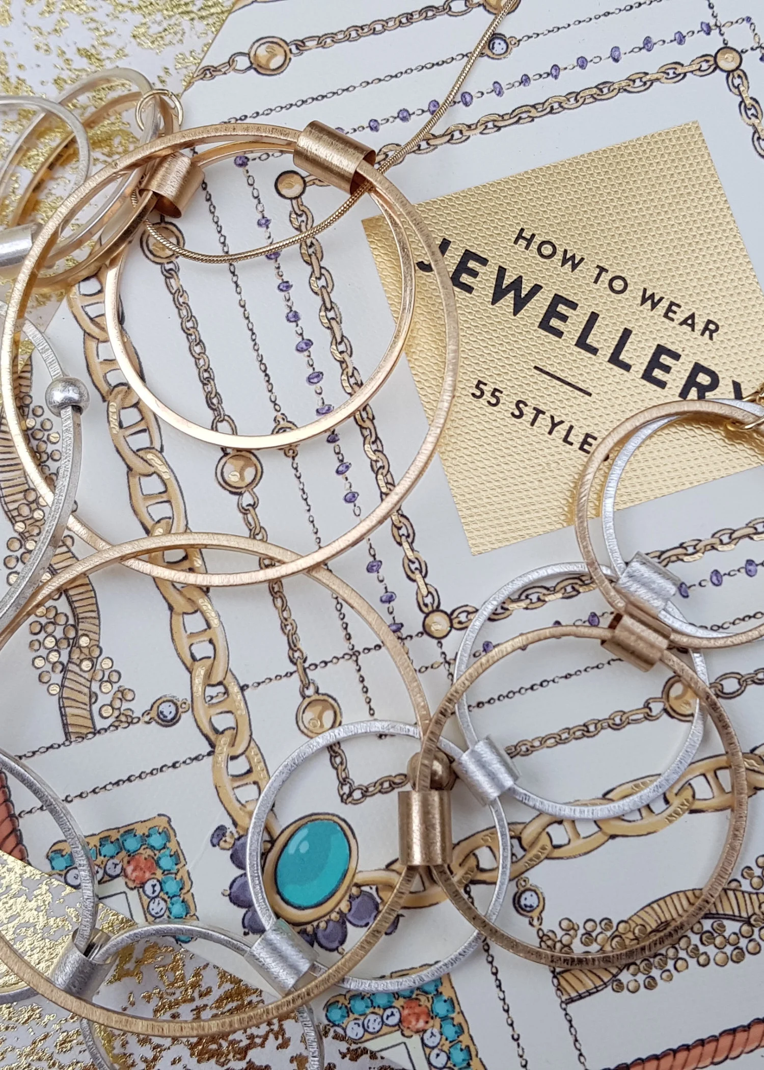 How to wear jewellery book and necklaces of interlocking metal circles.