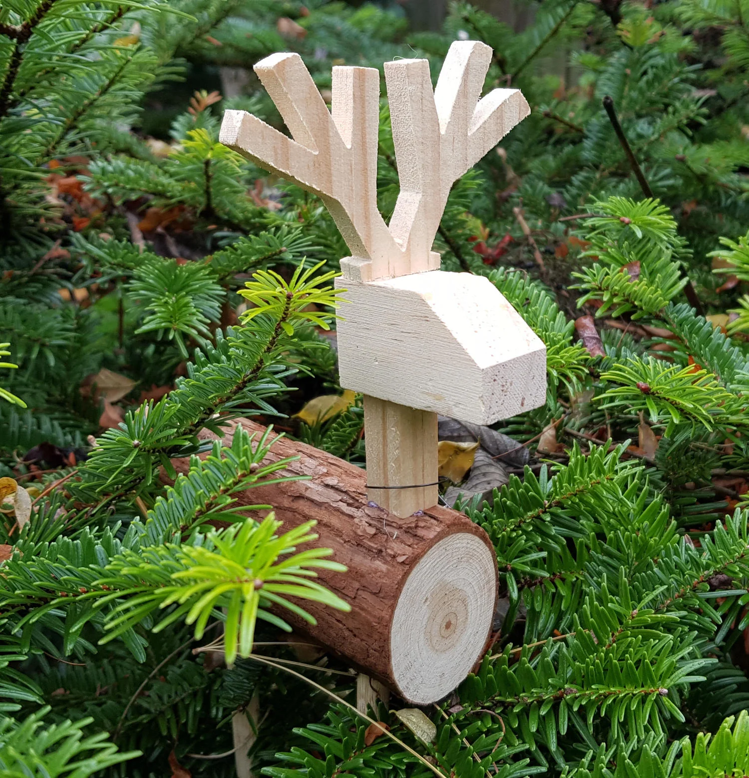 A rustic wooden reindeer christmas