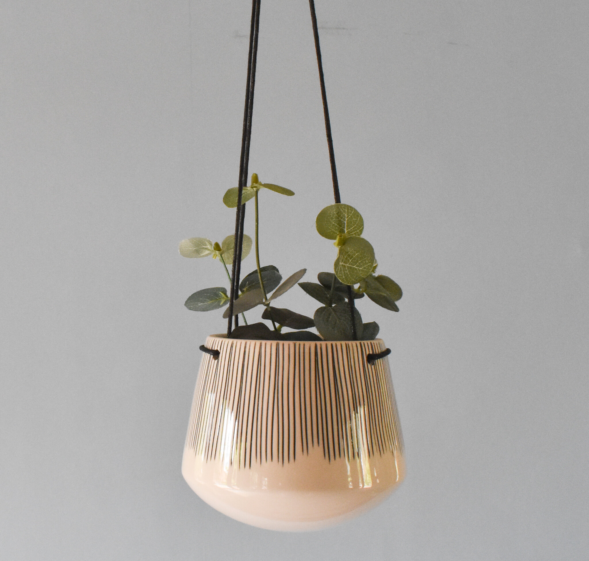 'Matamba' ceramic planter, by Nkuku, lines pattern.