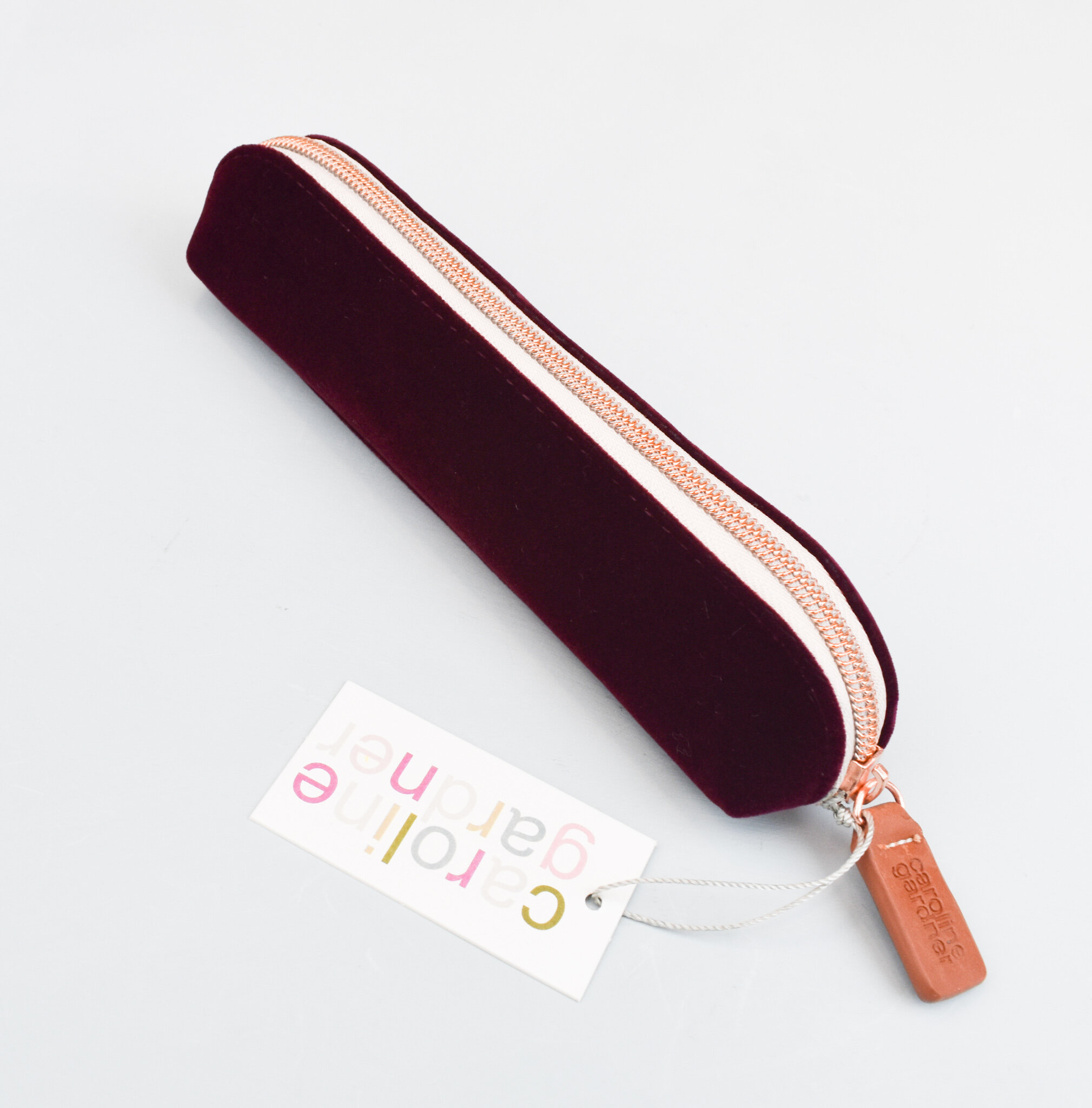Essential pencil case, burgundy velvet, by Caroline Gardner