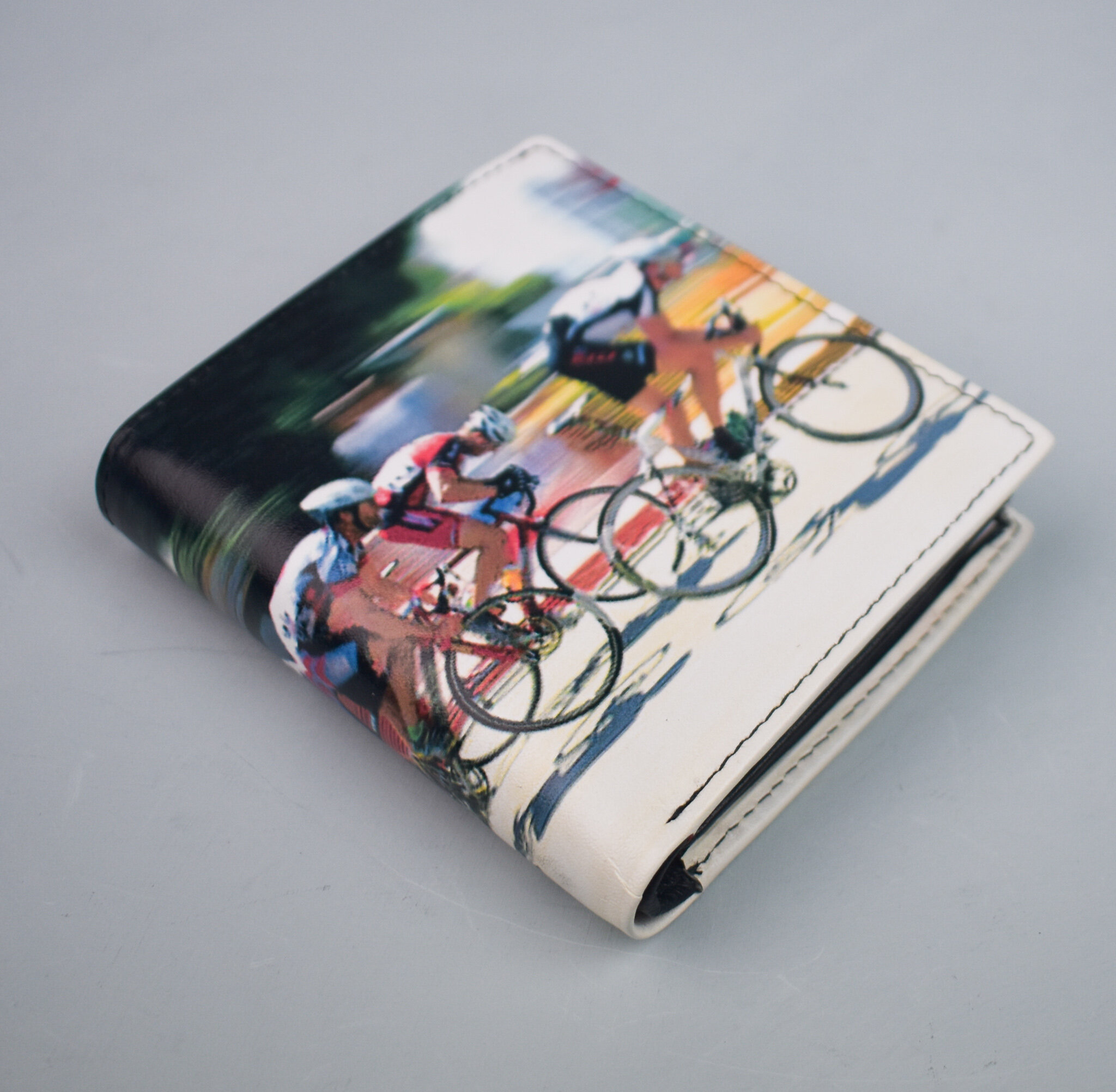 Retro Cyclists wallet by Golunski