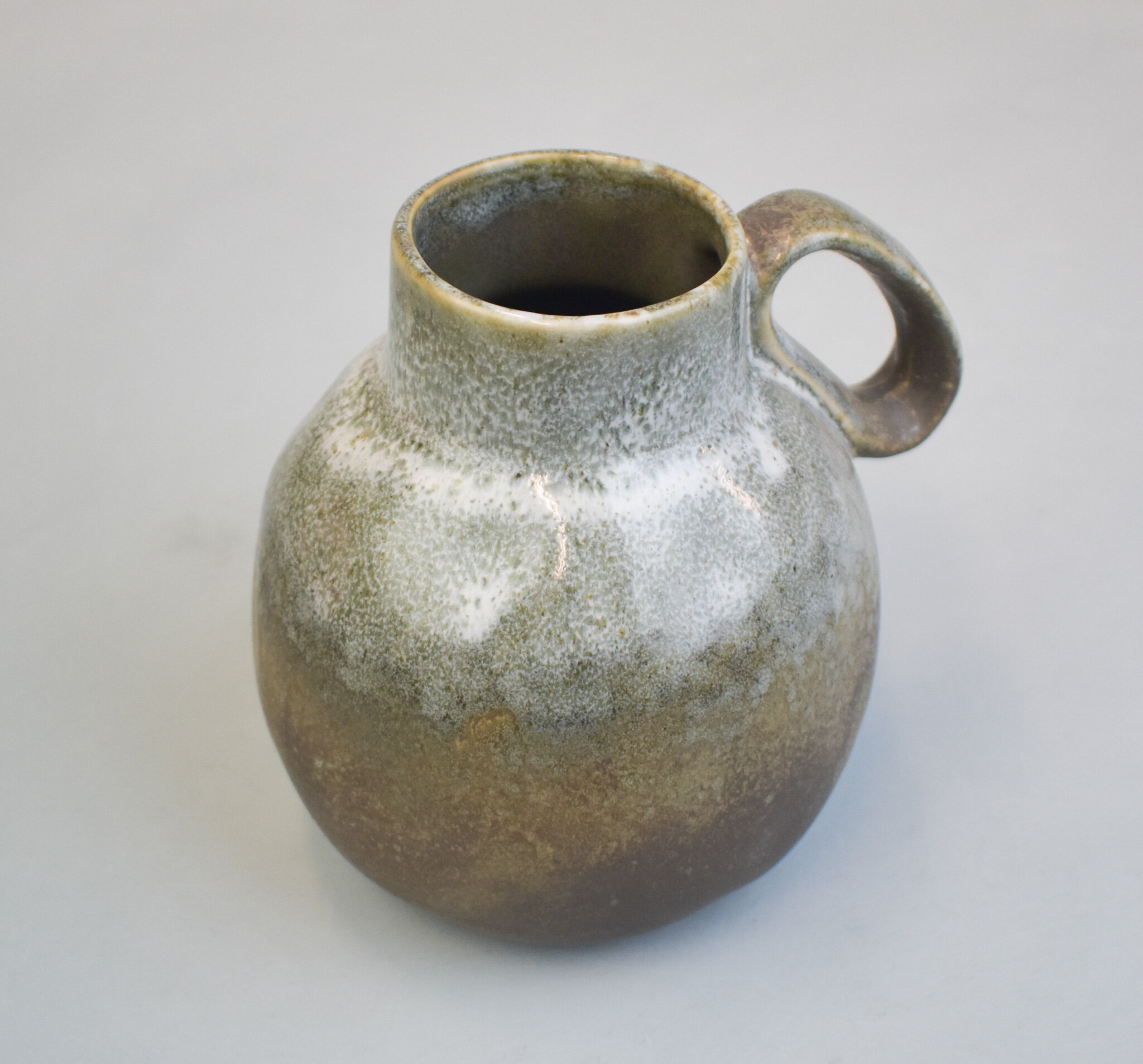 Rustic mottled ceramic jug, by Bloomingville