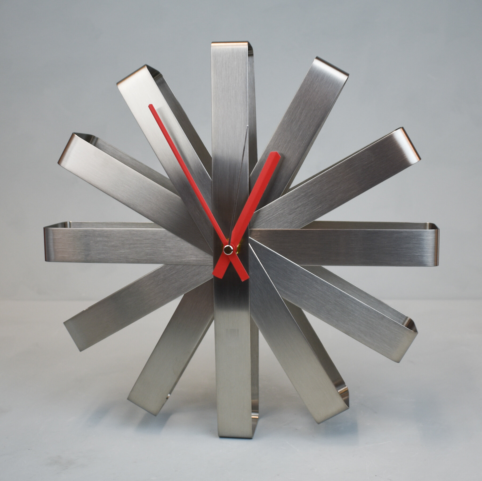 Ribbon steel wall clock, by Umbra