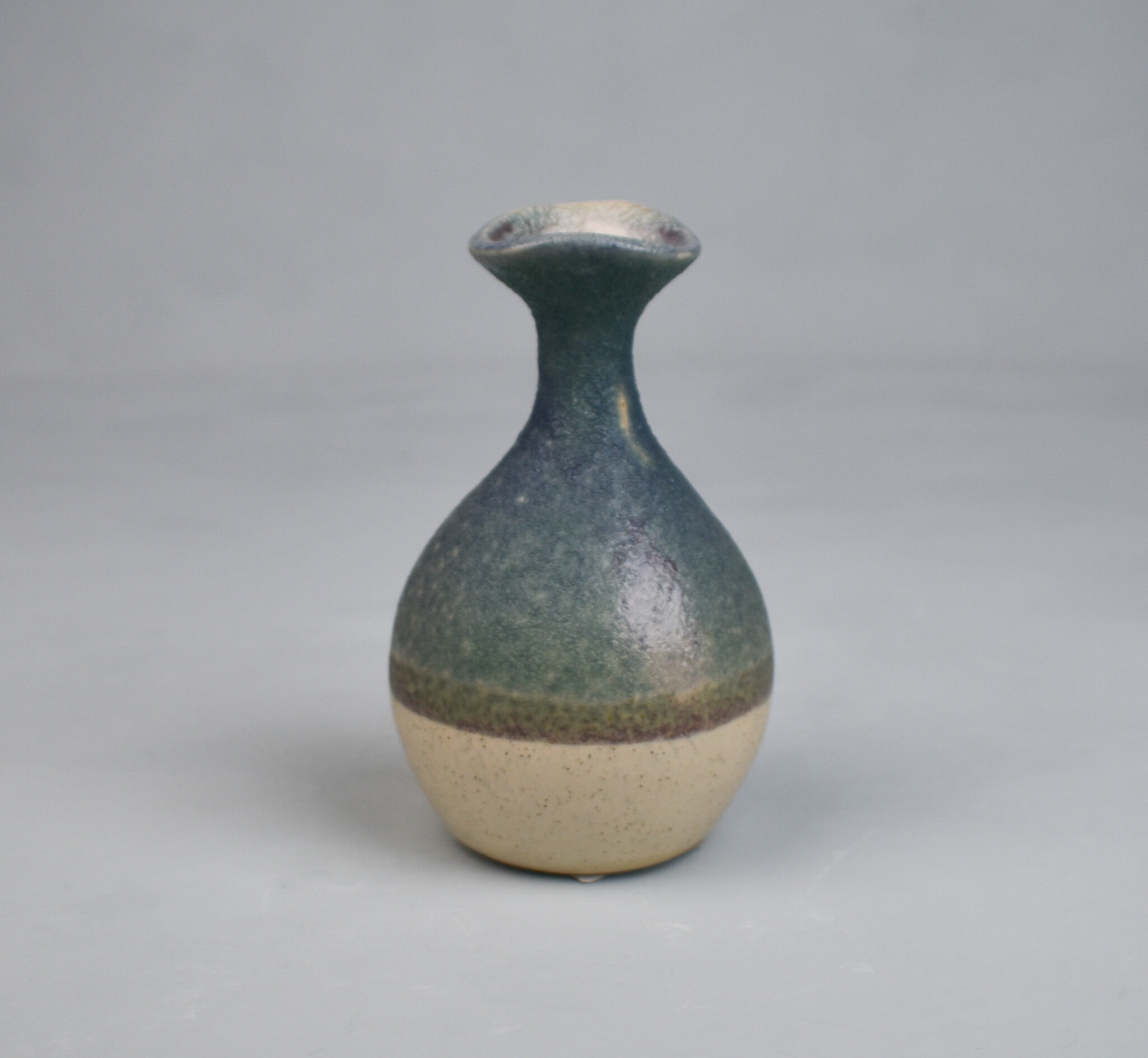 Trumpet neck small ceramic two-tone vase, by Bloomingville