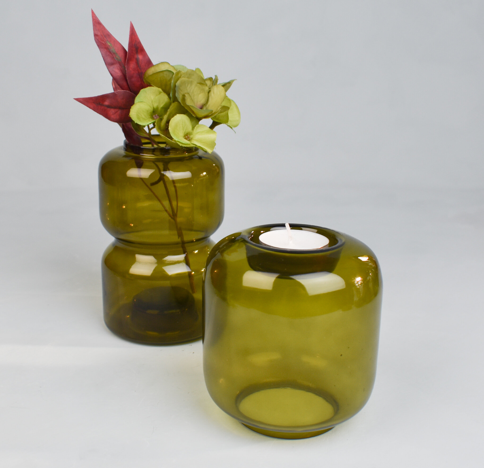 Dual function green vases/tealight holders, by Bloomingville.
