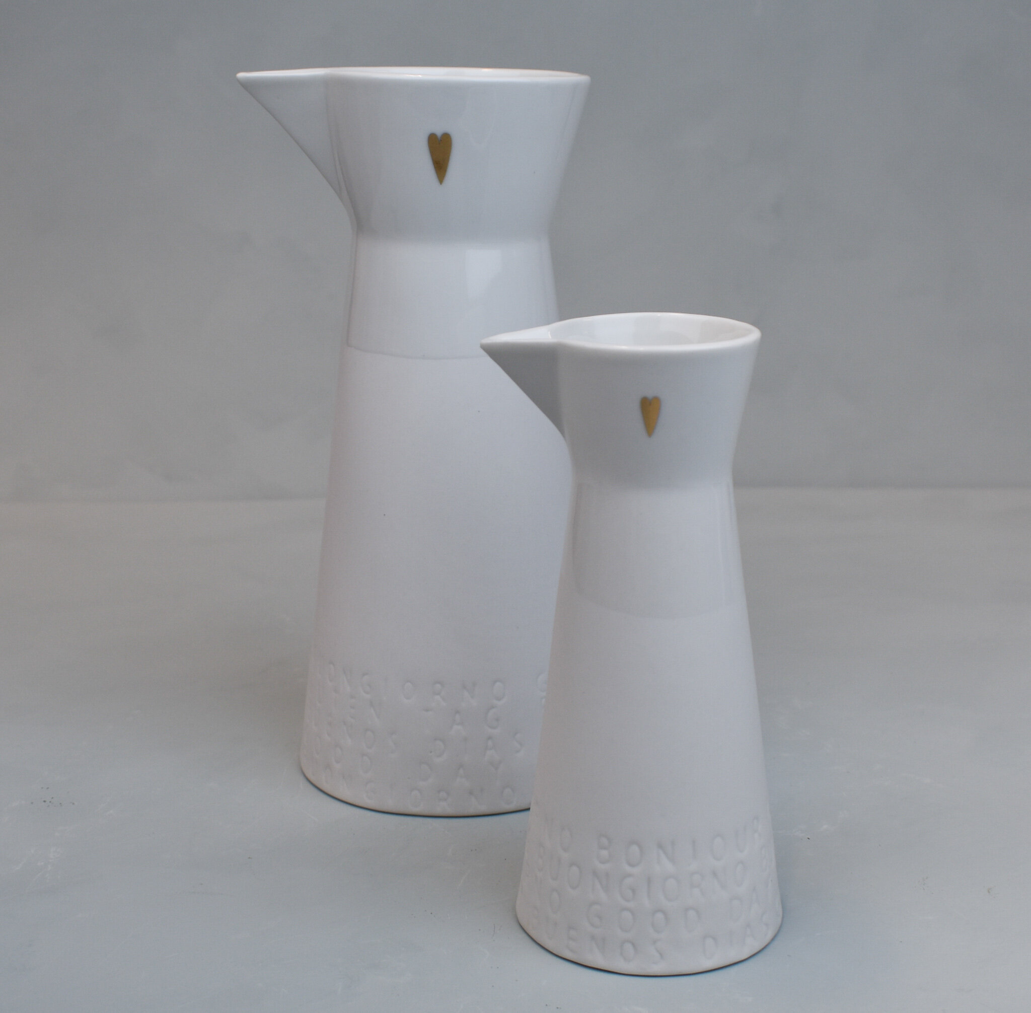 Porcelain gold heart detail 'Good day' jugs from Raeder