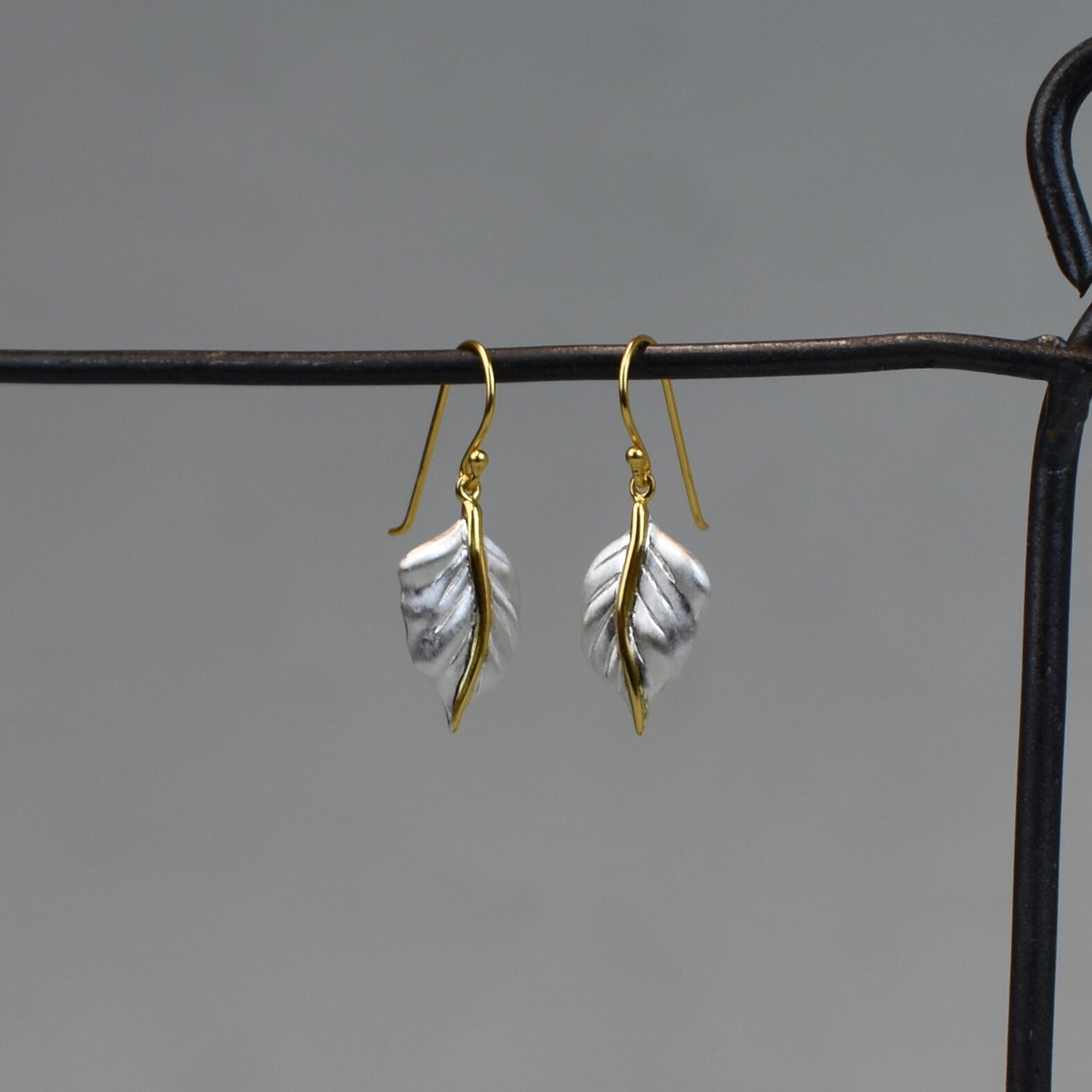 Gold leaf silver drop earrings, by Christin Ranger