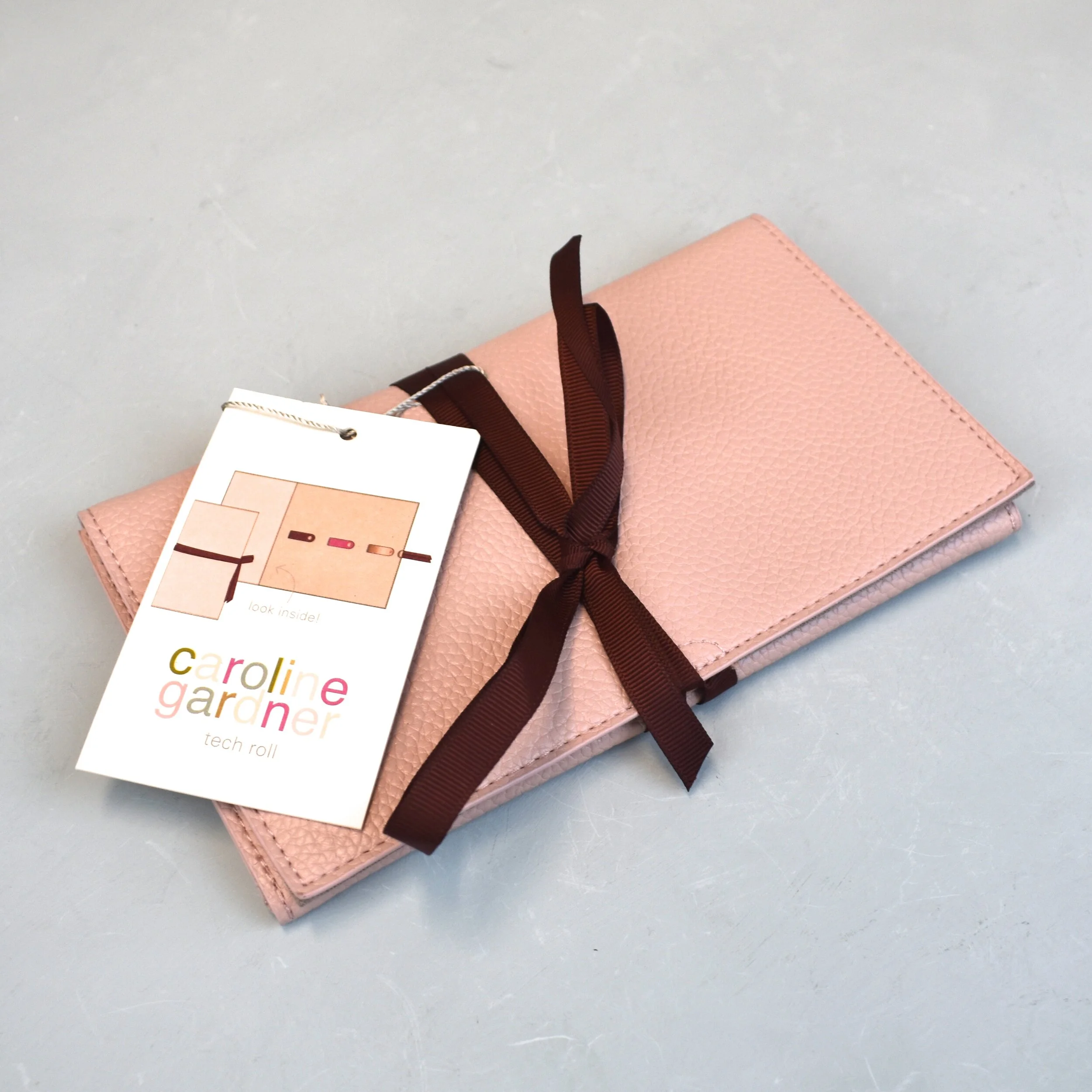 Pale pink tech roll, by Caroline Gardner