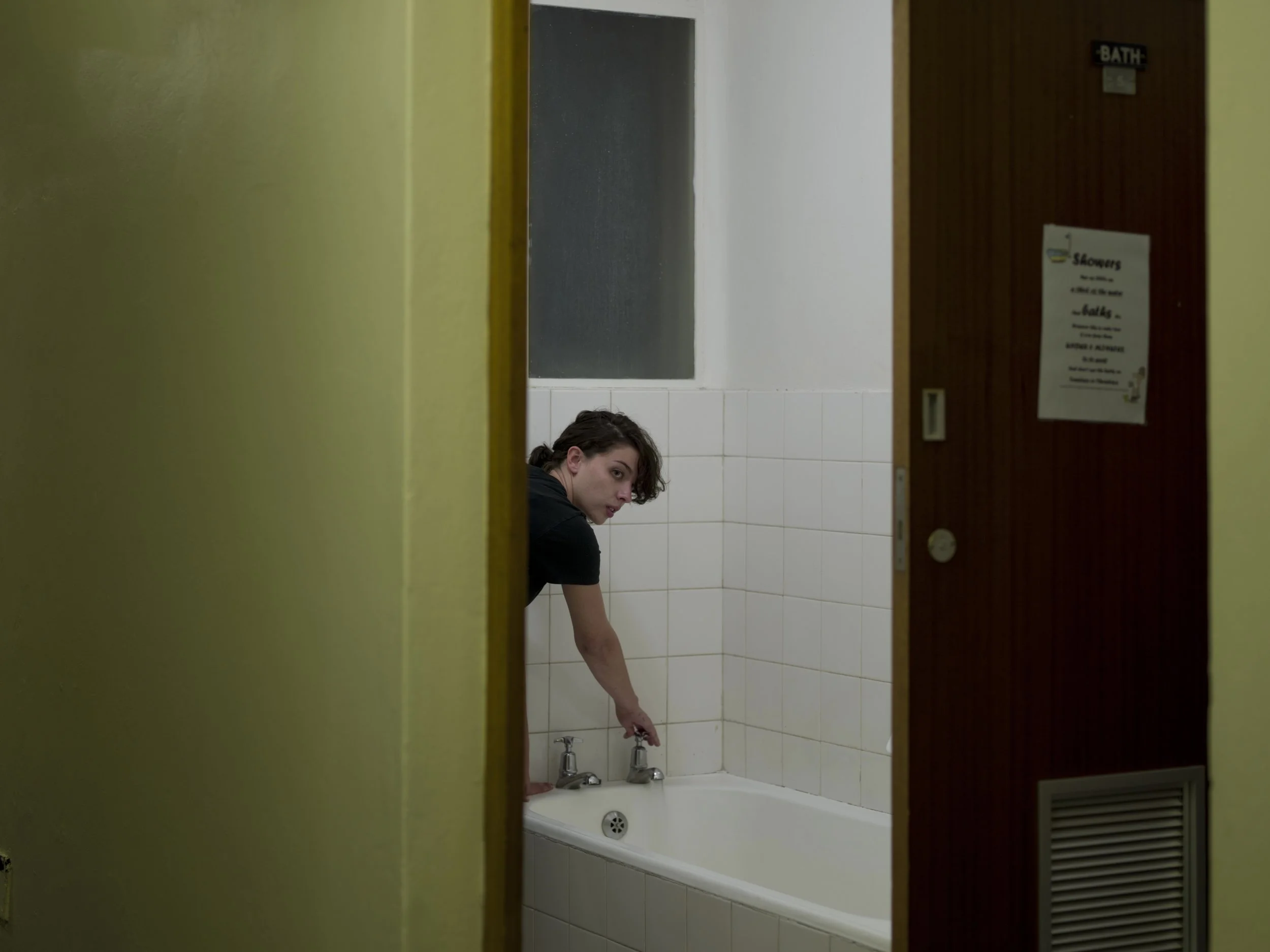 Alex running a bath, 2014