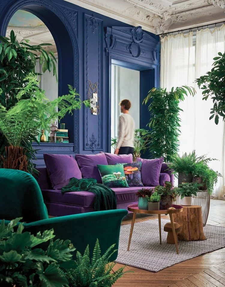 Vibrant solids - the blue and purple balance out the tremendous amount of greenery in this space. Courtesy of Pinterest