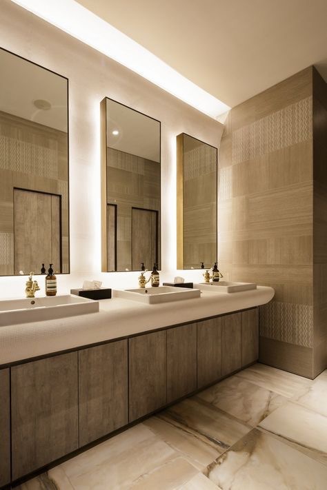 It’s especially important to enhance tranquility in office bathrooms, as stress levels tend to spike in the workplace. Courtesy of Pinterest