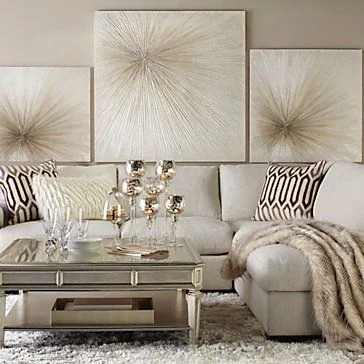 Shades of beige, taupe and black act as buffers between the different metallics present. (Courtesy of Pinterest)