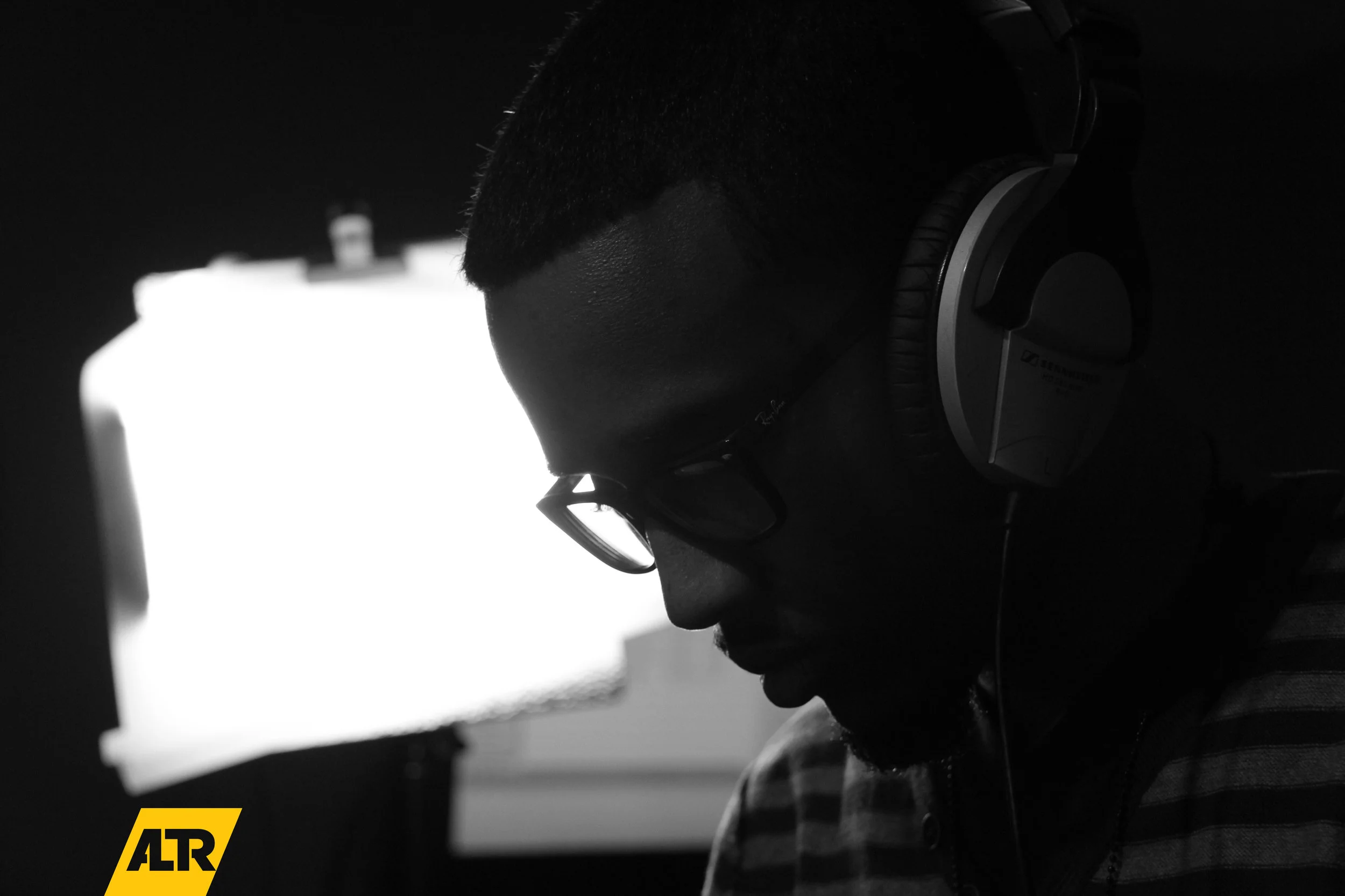  As a musician, we knew photography would be a key element to establishing ALTR's brand. So we setup a shoot, which I captured and directed. The goal was to capture high impact, stark, black &amp; white photos. These contrast nicely with the other br