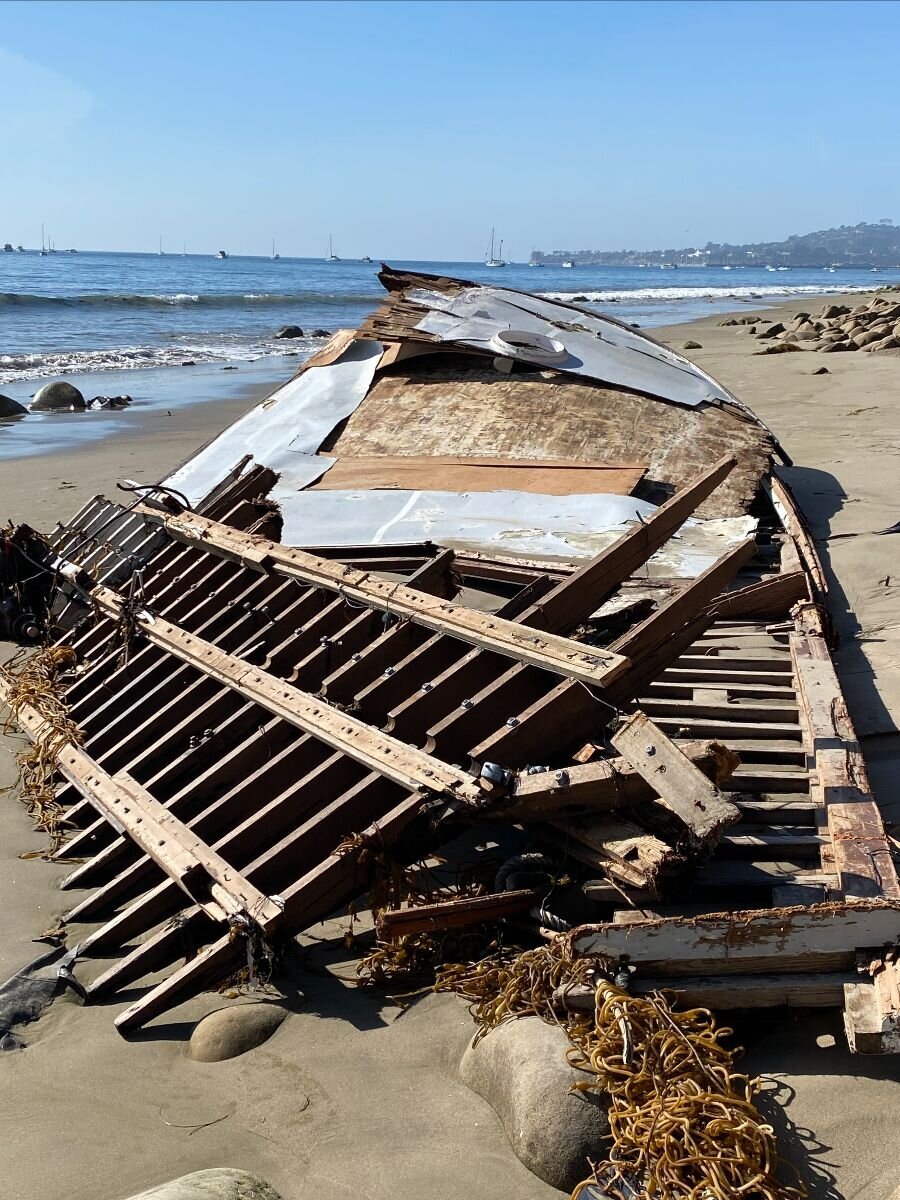  Boat hull on beach, Image by Harry Rabin/On the Wave Productions 