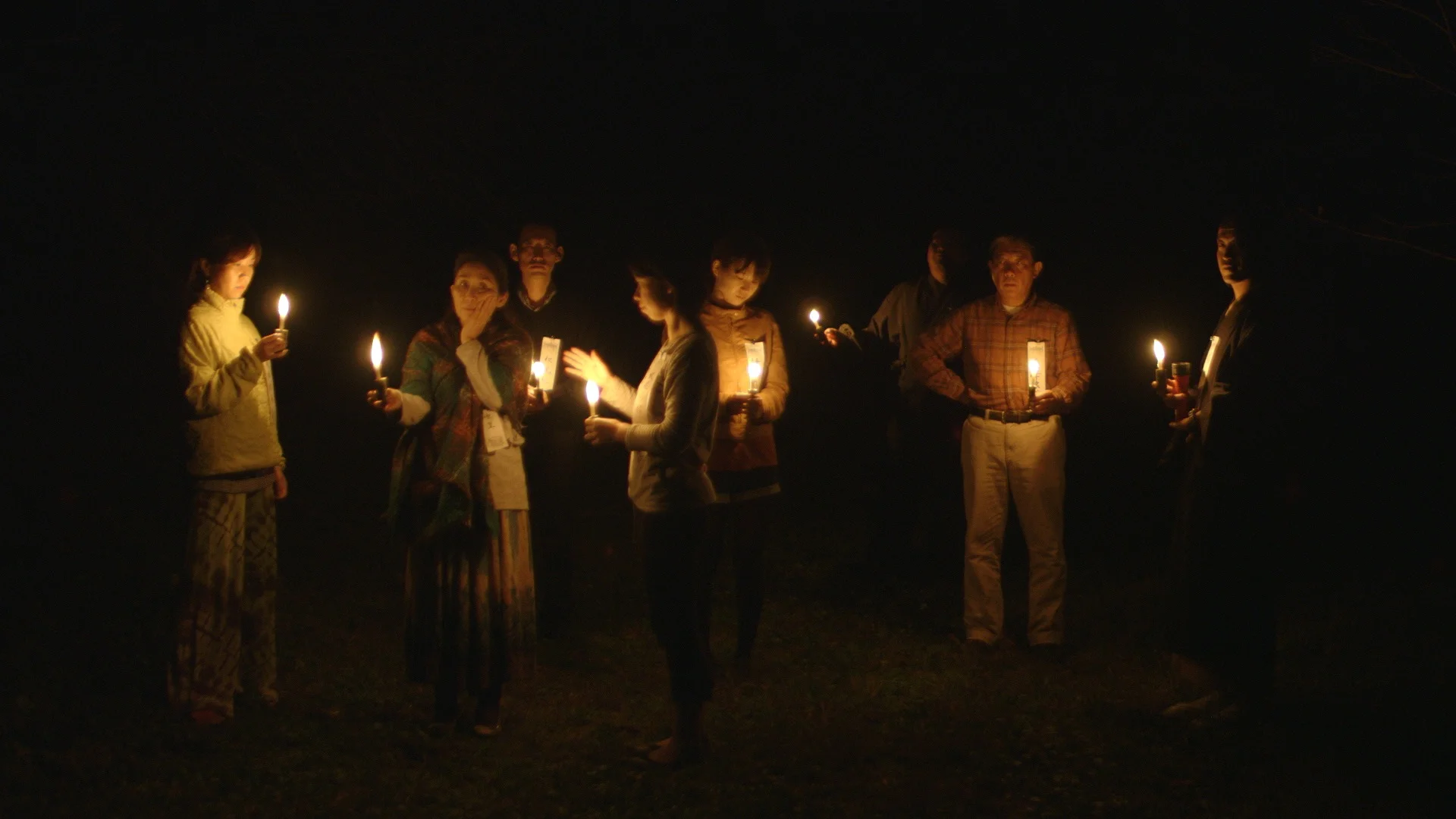 Participants in a retreat led by Ittetsu Nemoto. Film still from The Departure, directed by Lana Wilson, 2017. ©Drifting Cloud Productions