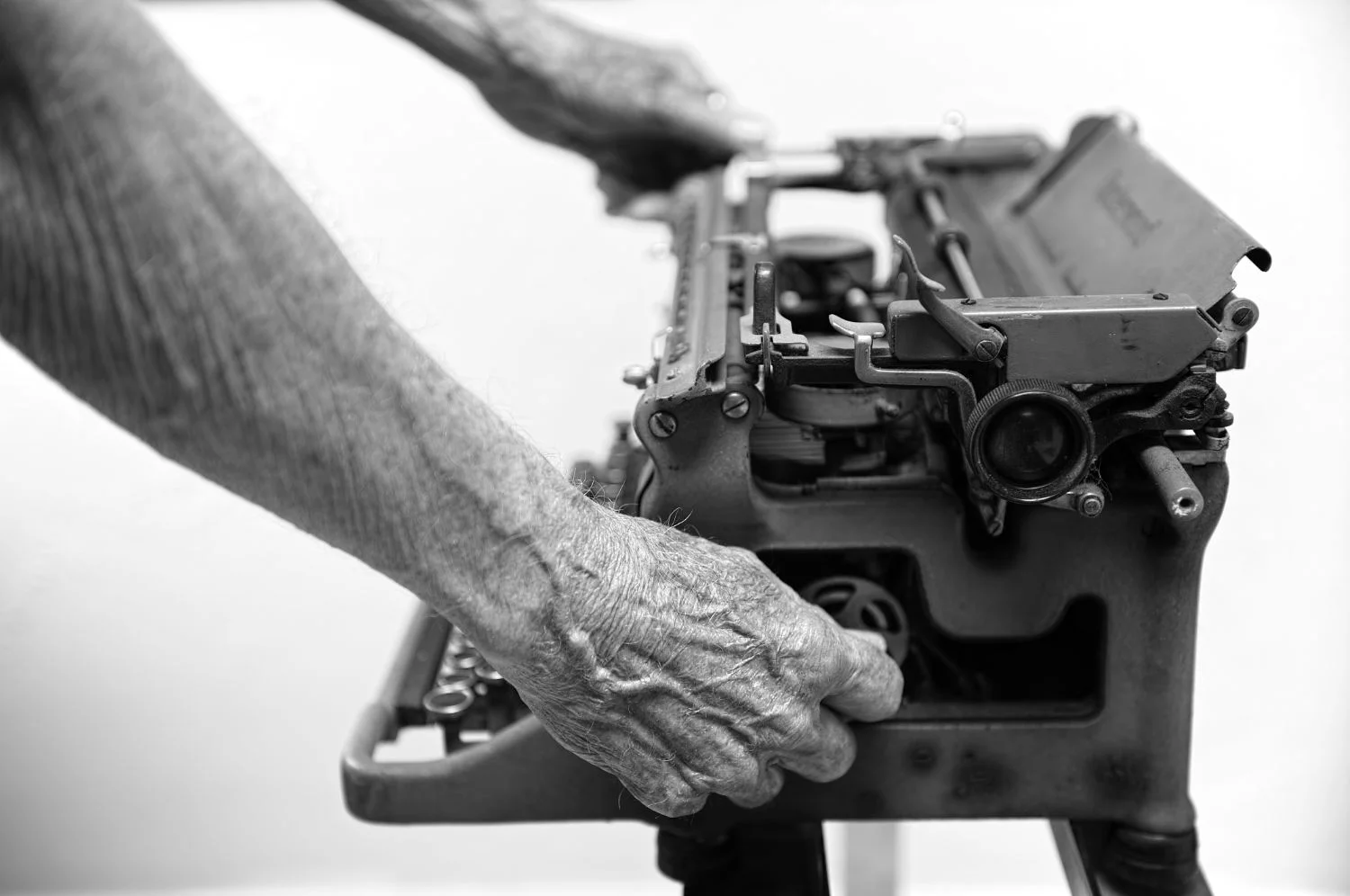 I snapped this photo in college while working as a first-time product photographer for a family’s yarn and knitting store. Their shop was on the first floor of a two-story building they owned. Upstairs was the fully furnished apartment of their grandfather, who collecting all sorts of things, including typewriters.