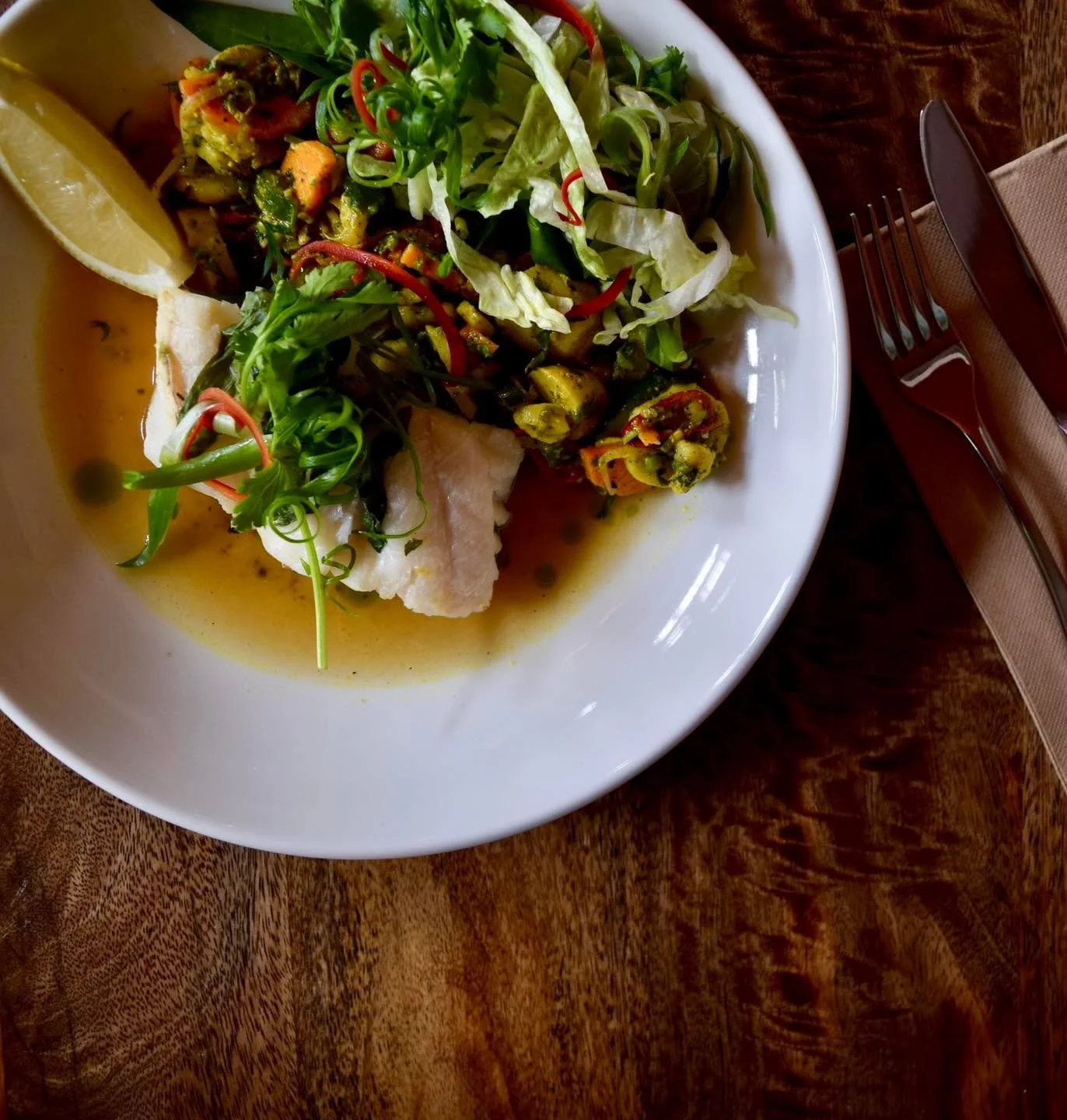 Baked Rockling en Papillote with Nepalese potato achar, mixed herb salad and tomato &amp; coriander broth (GF).

A beautiful choice for the warm weather.
Available on our specials board until sold out.