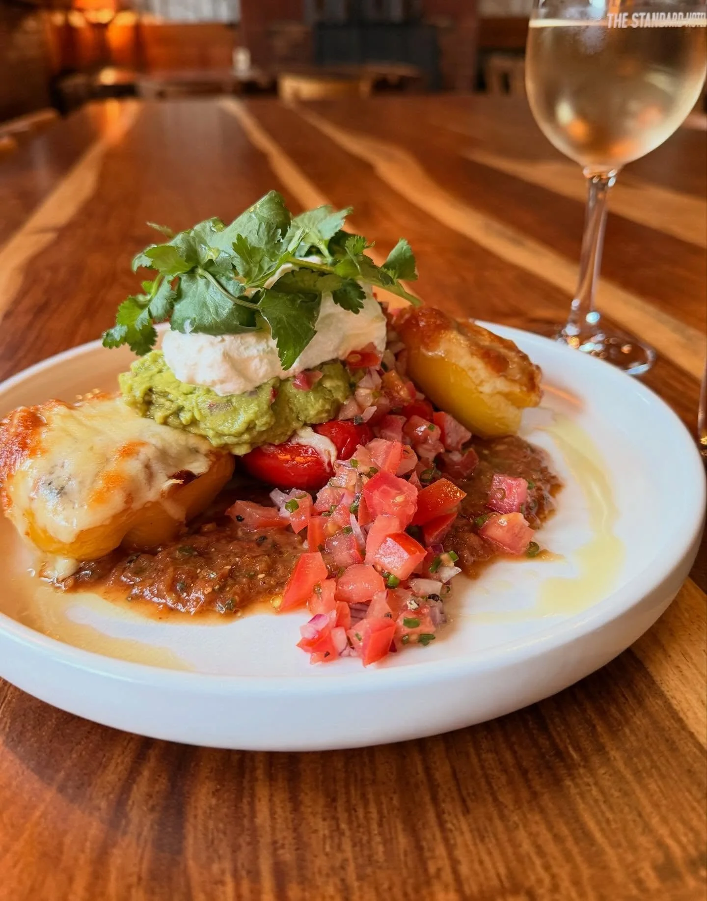 Our newest special, Mexican Style Roasted Peppers

Stuffed with a brown rice and bean mix, served on salsa roja and topped with guacamole and sour cream

Available on our specials board until sold out