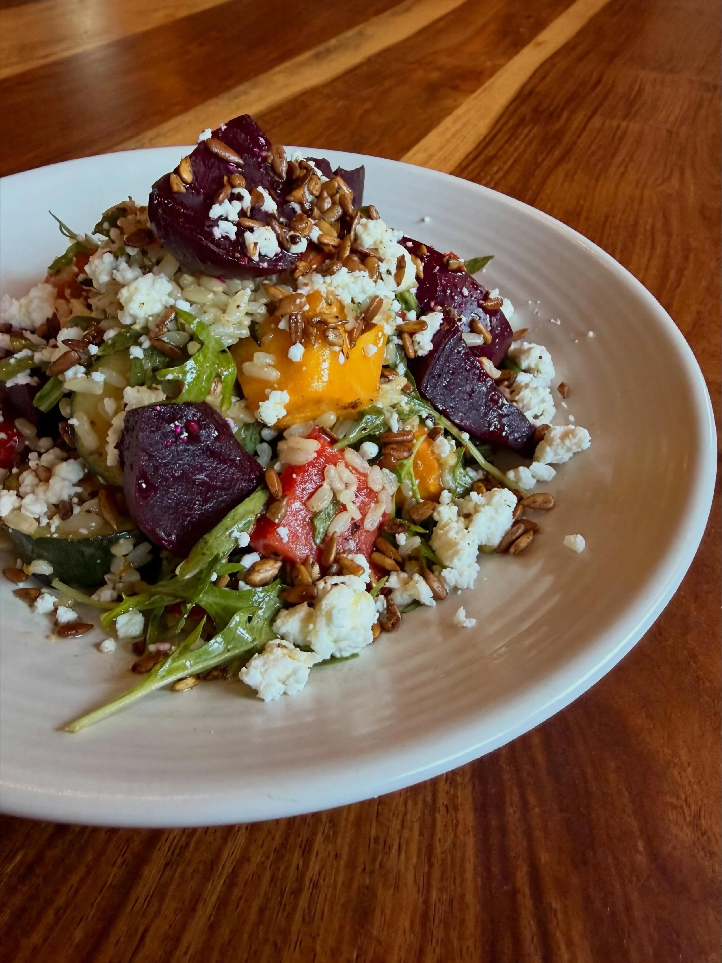 Roasted Warm Vegetable Salad, a new addition to our menu for winter.

Your favourite roasted vegetables with brown rice, rocket, sunflower seeds, ch&egrave;vre and lemon honey mustard dressing (GF).