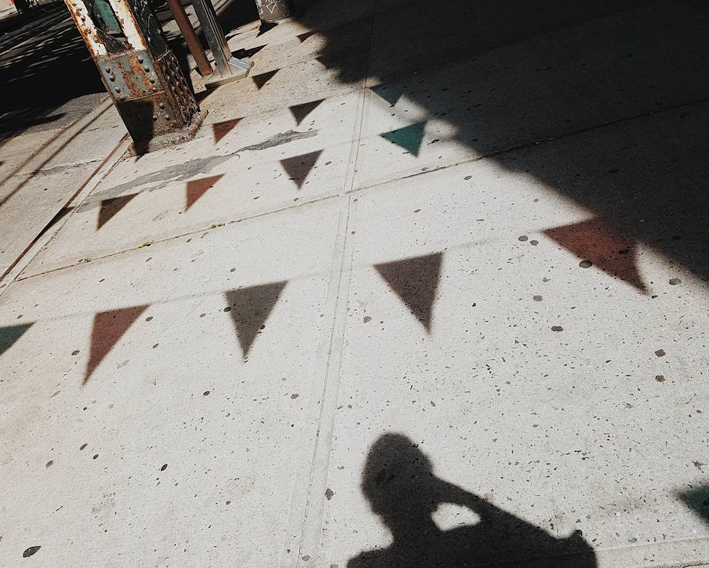 Samantha Harding • Brooklyn, NY / Boston, MA @samantharding Keeping my eyes down while walking is a natural instinct for me, especially living in a city. There’s a weird thing about looking up - for example, there’s discomfort in making eye contact with a stranger, and a fear of being mistaken for a tourist marveling at the city towering above. Therefore, I navigate my way through the city looking down at the sidewalk instead - and I still get to enjoy everything above me, from a different perspective, through what is cast down on the ground beneath me.