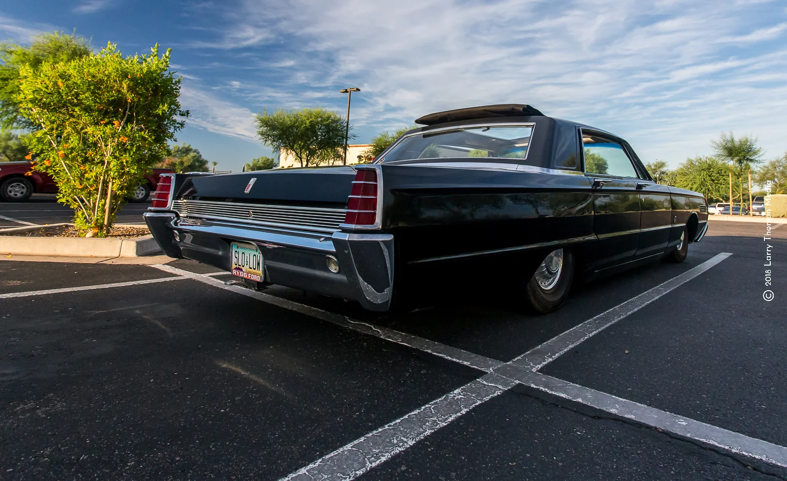 Usually, there would be a badge on the rear fender to clear up the mystery.